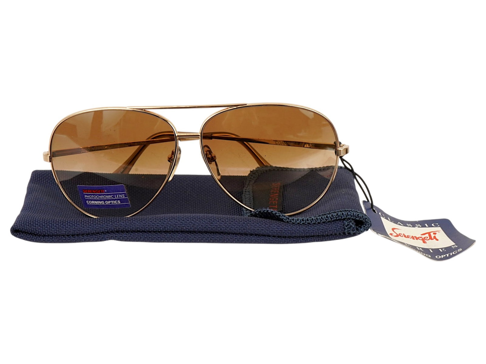 NEW SERENGETI DRIVERS AVIATOR SUNGLASSES W POUCH: A new Serengeti Drivers Aviator Sunglasses featuring high-performance Corning Optics. Complete with the original purple lens sticker and paper hanging retail tag. A classic dual-bridge metal teardrop 