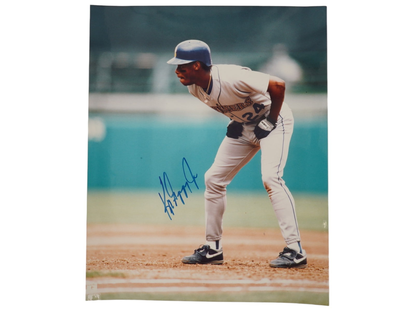 KEN GRIFFEY JR AUTOGRAPHED PHOTO: This authentic autographed photograph of Ken Griffey Jr. depicts the Hall of Fame outfielder in his Seattle Mariners uniform and includes an official TV Sports Mailbag license. MLB, Mariners, The