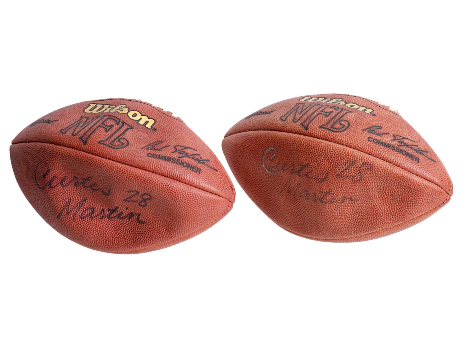 LOT OF 2 NY JETS CURTIS MARTIN SIGNED FOOTBALLS: This lot features two footballs signed by Hall of Fame running back Curtis Martin during his career with the New York Jets. Both balls are ideal for team-specific collectors. Jets, Curtis Martin, NFL,
