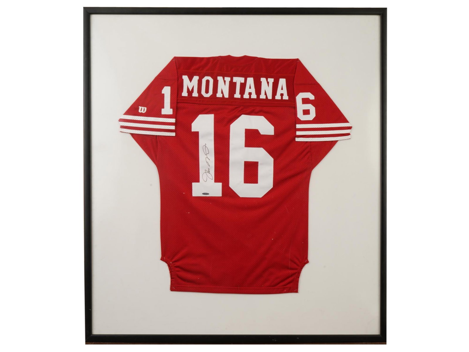 JOE MONTANA SIGNED FRAMED 49ERS JERSEY UD AUTH: An authentic San Francisco 49ers jersey signed by legendary quarterback Joe Montana. The item is authenticated by Upper Deck (UD) and presented in a high-quality shadowbox frame. NFL, 49ers, QB, Upper