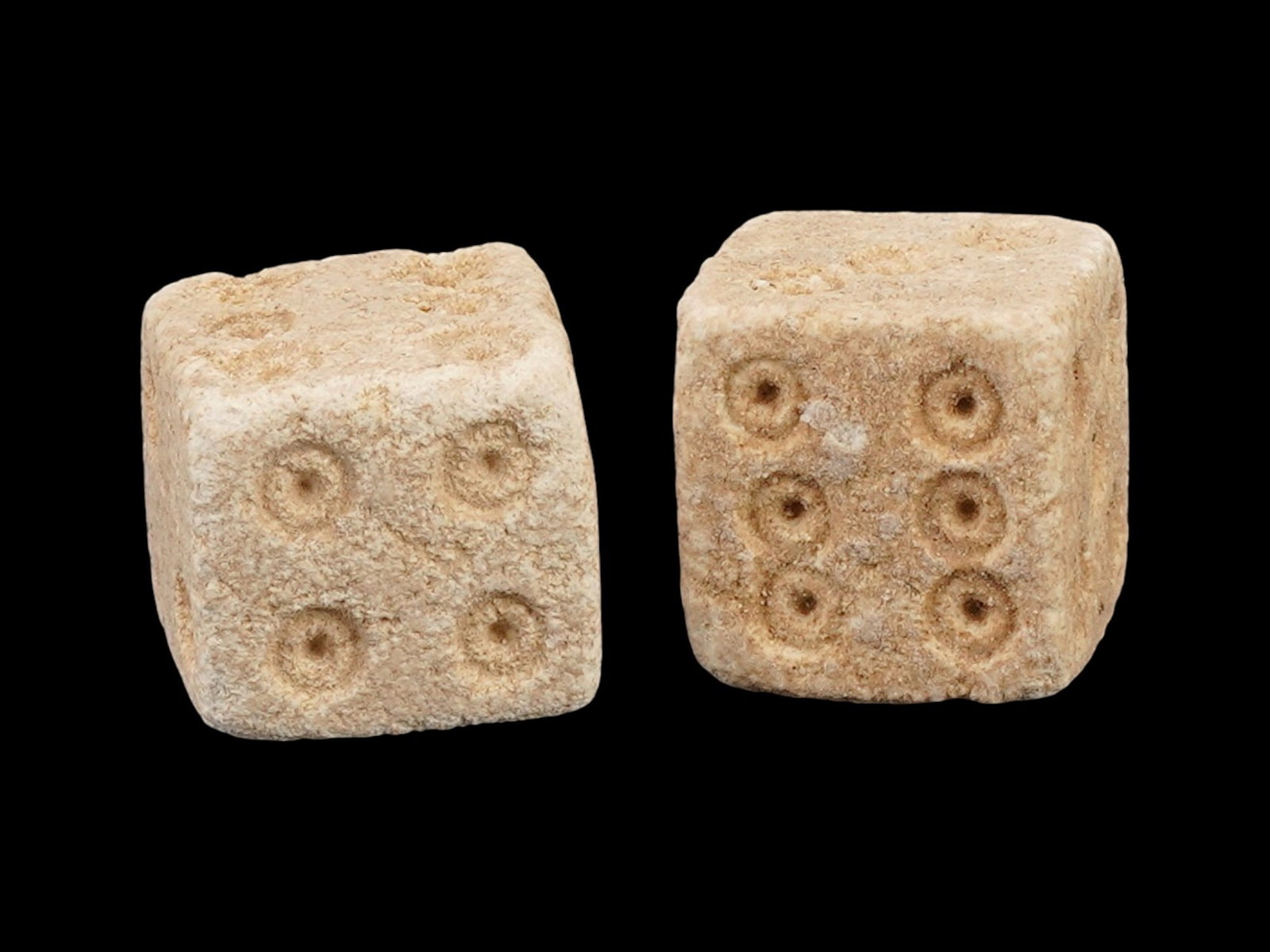 PAIR OF ANCIENT ROMAN STONE DICE 100 TO 300 AD: A pair of ancient Roman carved stone gaming dice. Imperial Rome era, circa 100 to 300 AD. Square shape. Archaeological Finds And Relics, Stone Carvings, and Collectibles. THIS LOT IS ELIGIBLE F