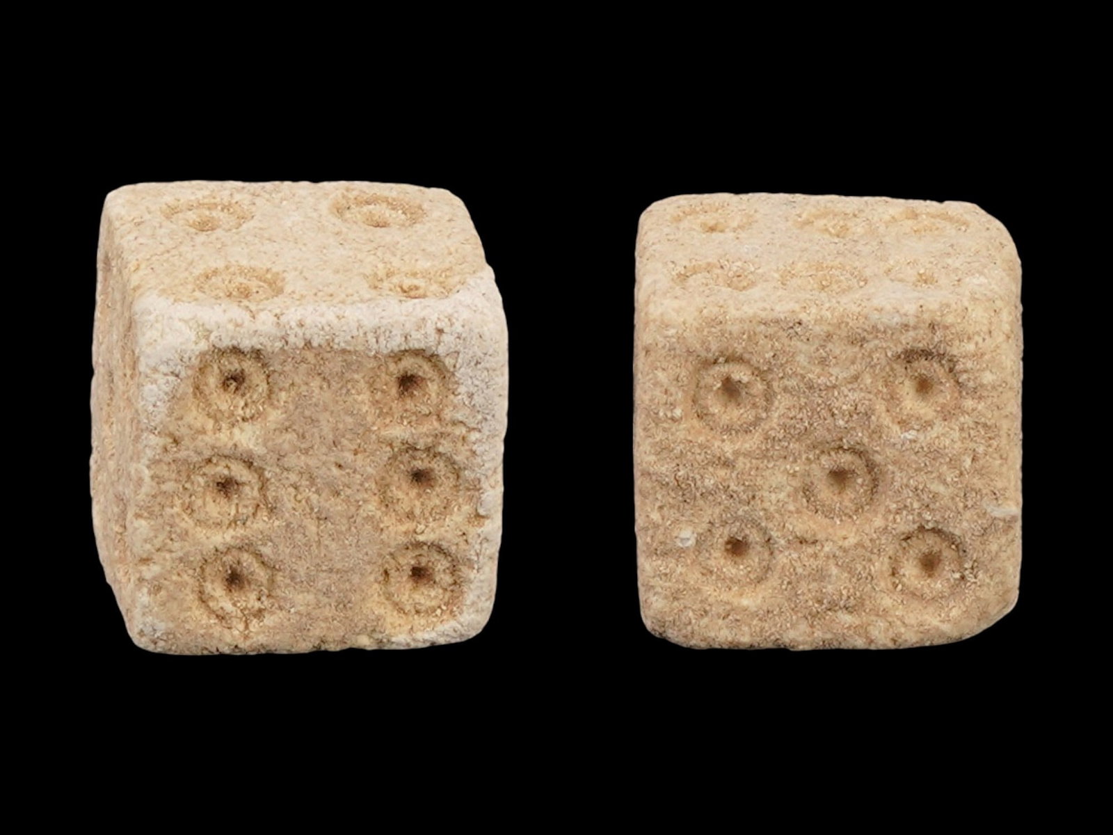 PAIR OF ANCIENT ROMAN STONE DICE 100 TO 300 AD: A pair of ancient Roman carved stone gaming dice. Imperial Rome era, circa 100 to 300 AD. Square shape. Archaeological Finds And Relics, Stone Carvings, and Collectibles. THIS LOT IS ELIGIBLE F