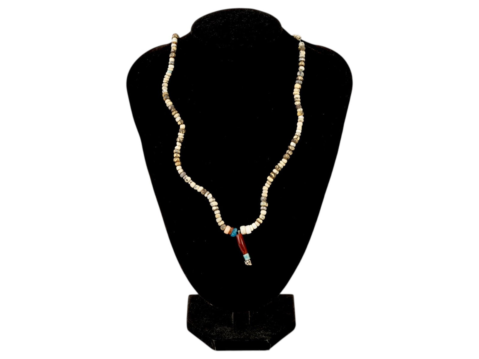 ANCIENT ROMAN GLASS STONE BEAD NECKLACE 100 TO 300 AD: An ancient Roman beaded necklace dating from 100 to 300 AD. The necklace showcases a range of bead colors, mostly circular shaped, reflecting the Roman eras intricate glasswork and appreciation for vi