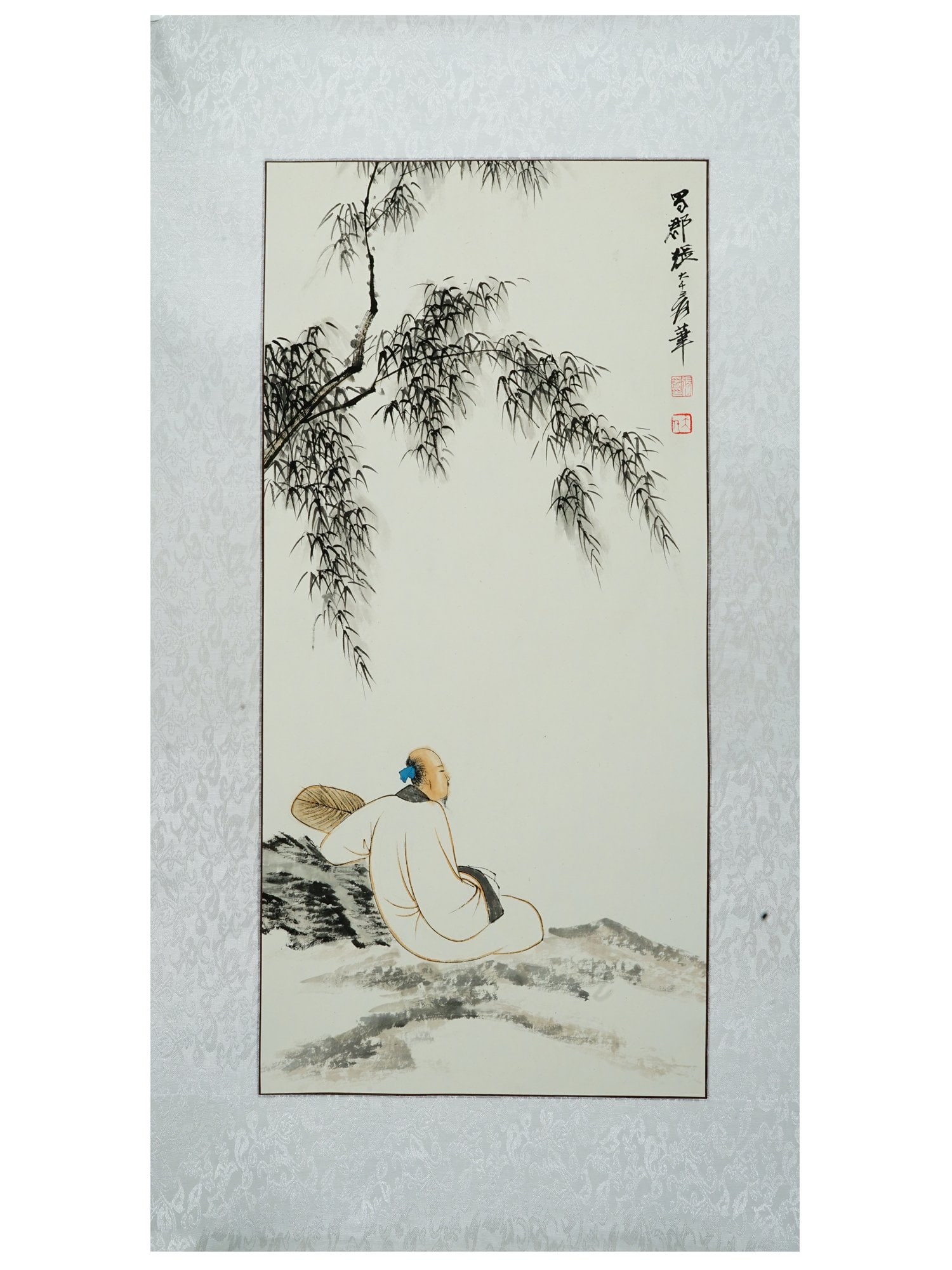 VINTAGE CHINESE PAINTING ATTRIBUTED TO ZHANG DAQIAN: A vintage Chinese painting attributed to Zhang Daqian. The painting, executed in ink and color, depicts a scholar or sage seated in contemplation beneath the sweeping branches of a willow tree. A vert