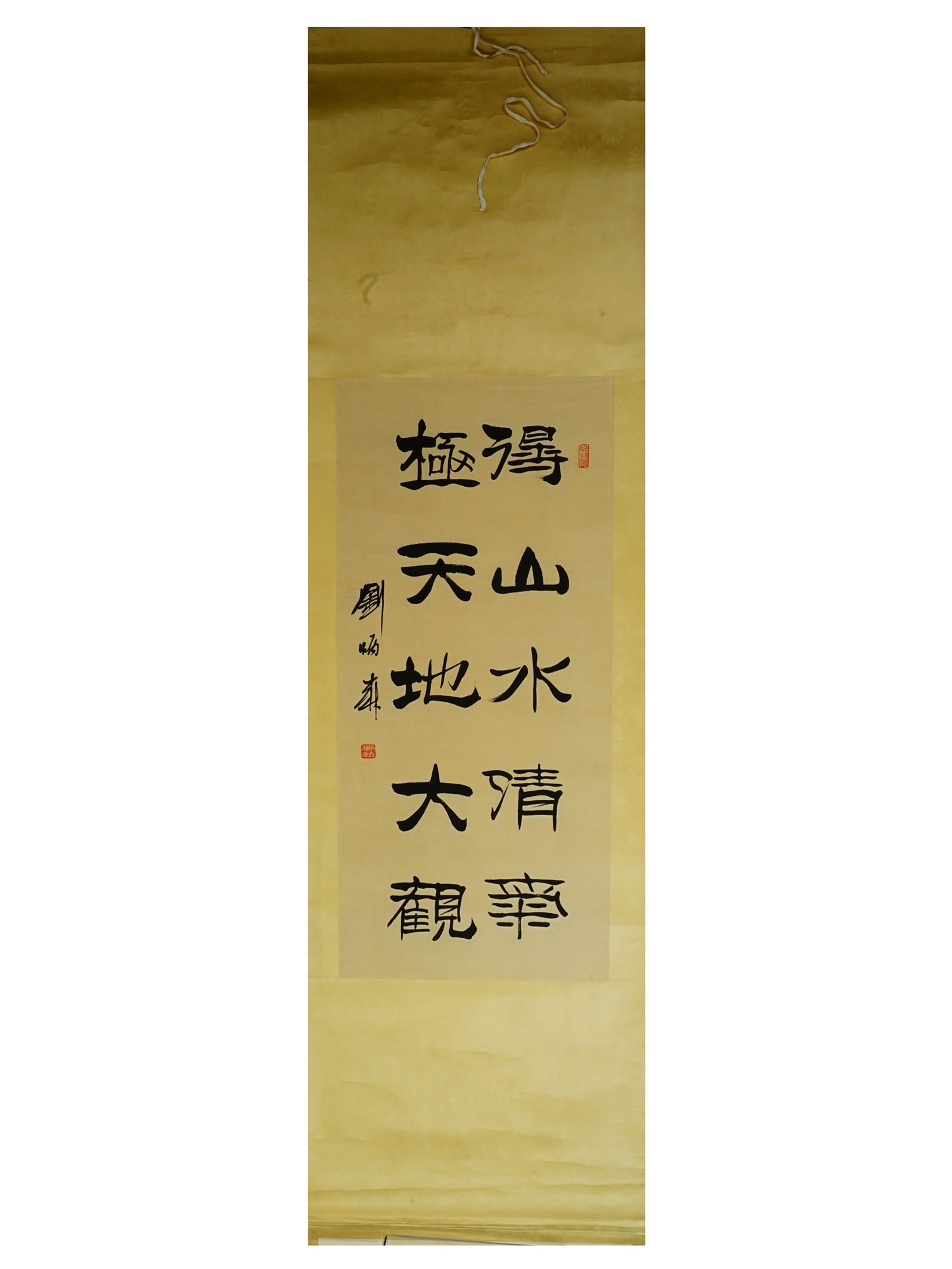VINTAGE CHINESE CALLIGRAPHY HANGING SCROLL: A vintage Chinese hanging scroll featuring bold calligraphy in Clerical Script Lishu, an ancient style known for its strong horizontal emphasis. The inscription reads The mountains and waters of Mt. W