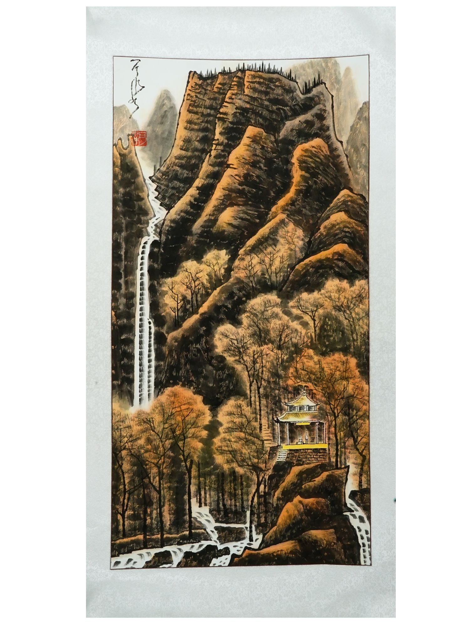 CHINESE LANDSCAPE INK AND WATERCOLOR PAINTING SCROLL: A Chinese mixed media, ink and watercolor, painting scroll in the style of traditional Chinese landscape painting Shan Shui. The painting depicts a genre scene in a mountain landscape with waterfalls,