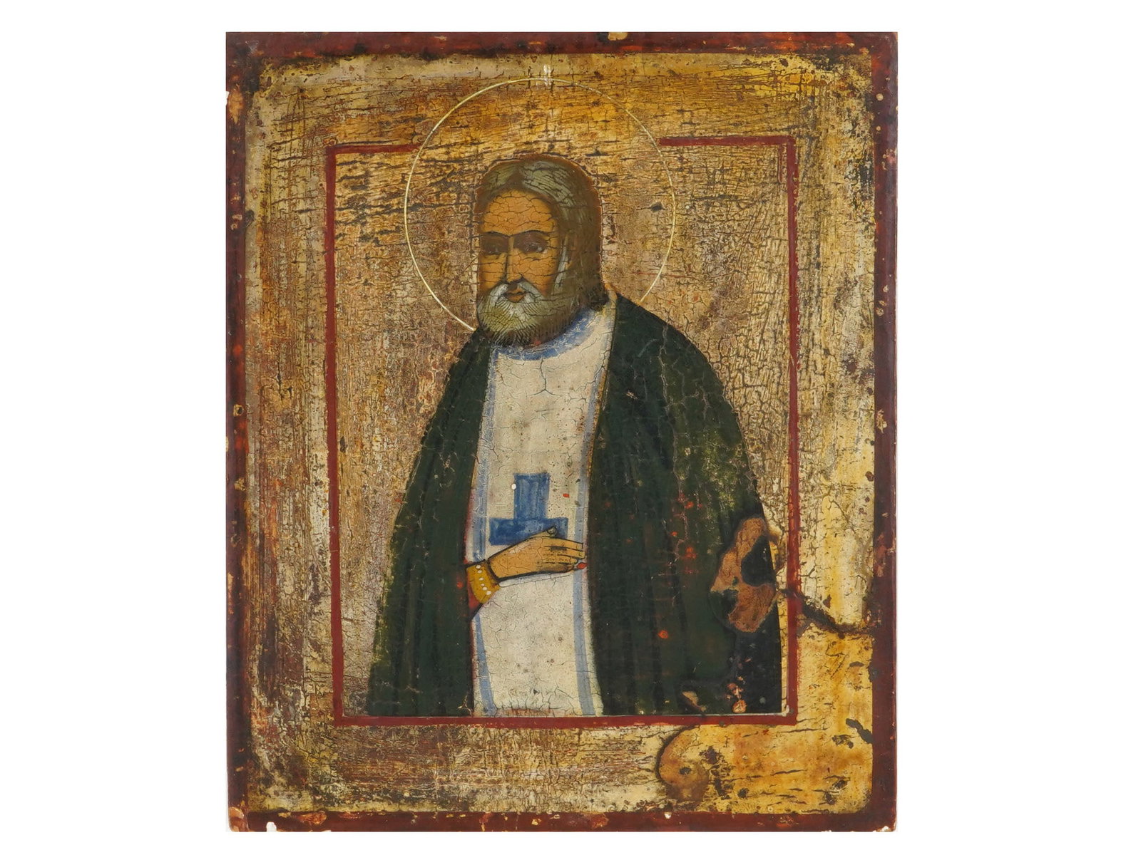 19TH C RUSSIAN ORTHODOX SAINT SERAPHIM OF SAROV ICON: An antique 19th century Russian Orthodox icon representing Saint Seraphim of Sarov on a gild background with kovcheg. Mixed media painting: egg tempera, gesso, and levkas on a wood board. Antique Russ