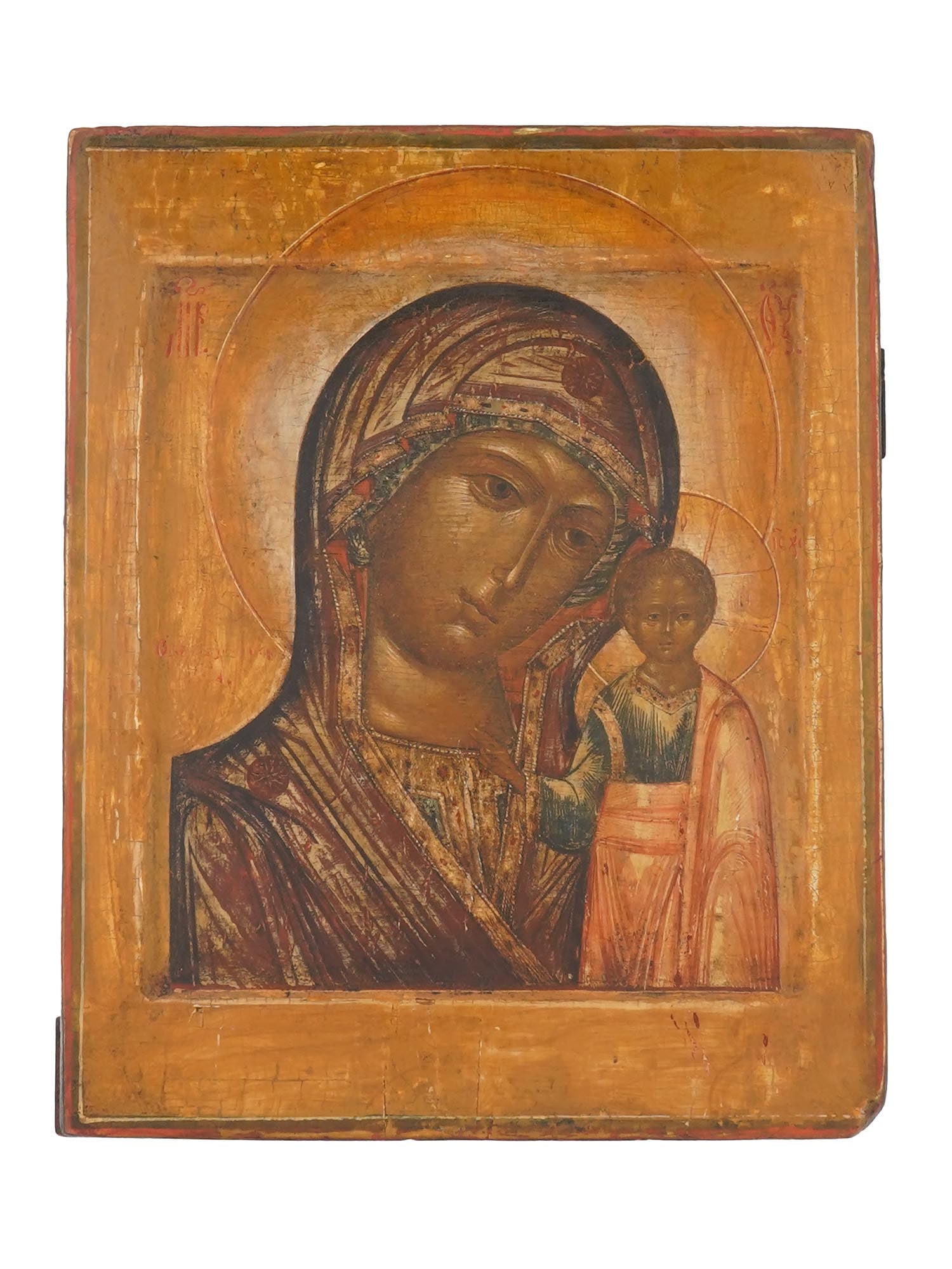ANTIQUE RUSSIAN ORTHODOX ICON MOTHER OF GOD OF KAZAN: An antique Russian Orthodox icon of the Mother of God of Kazan, painted in tempera on wood panel with kovcheg. The Our Lady of Kazan, also known as the Mother of God of Kazan, is among the most venera