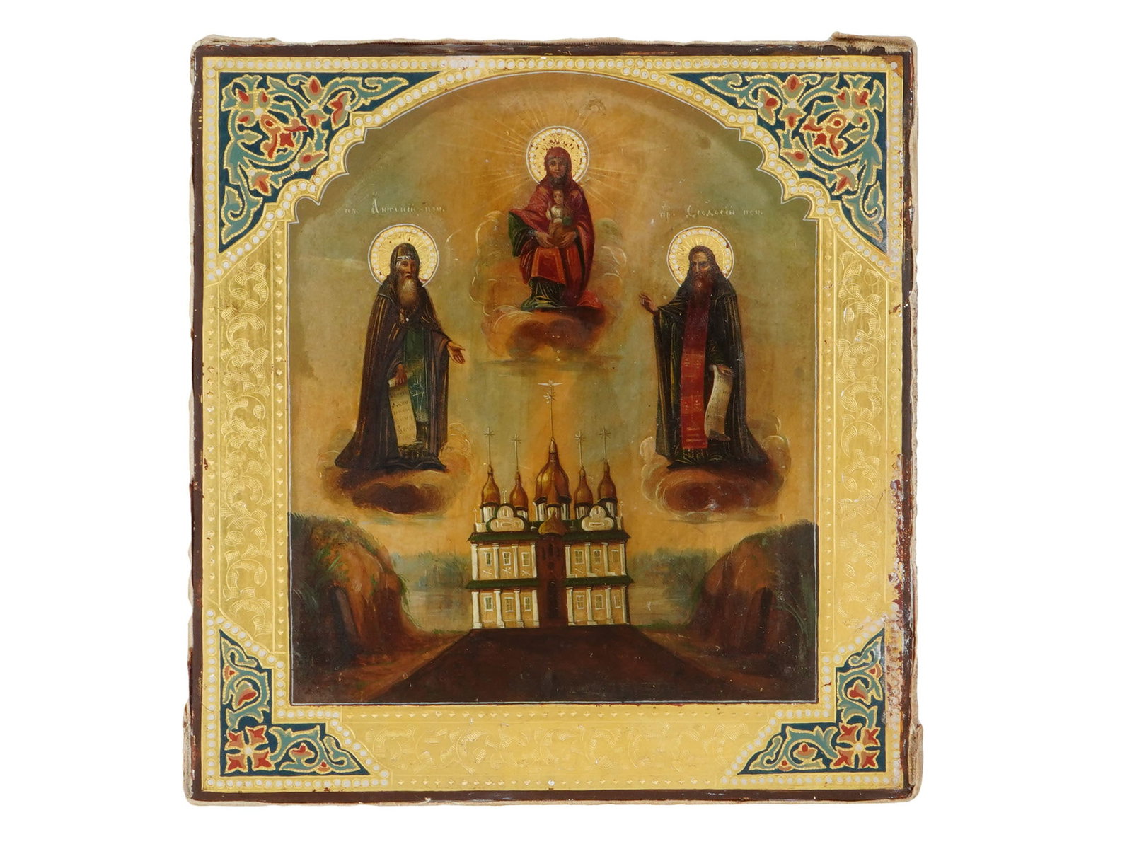 19TH CEN RUSSIAN PECHERSKAYA MOTHER OF GOD ICON: A Russian Orthodox hand painted icon of Mother Of God Pecherskaya and the Venerable Pechersk Miracle Workers Anthony and Theodosius. The mixed media icon with egg tempera, gesso, and levkas on a wood 