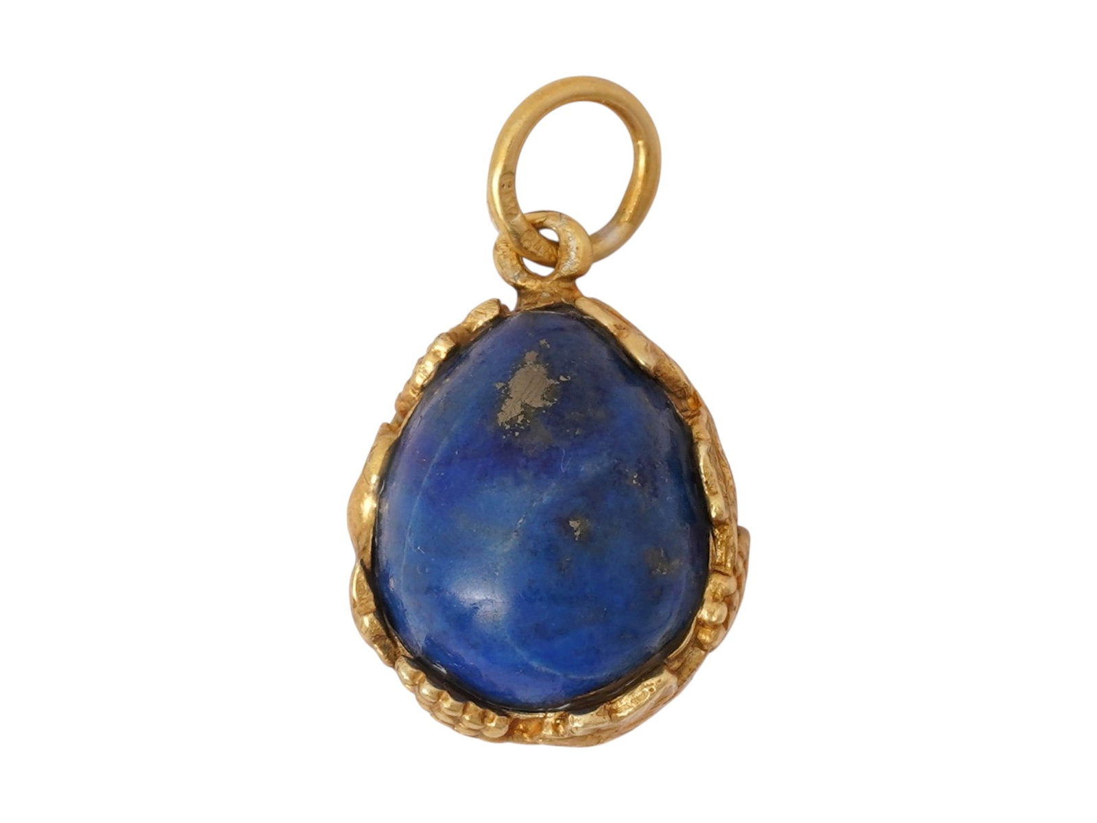 RUSSIAN 84 GILT SILVER LAPIS LAZULI EGG PENDANT: A Russian 84 gilt silver Easter Egg pendant. The egg is made from a hand carved Lapis Lazuli stone and adorned with a relief gilt silver case made in a grape vines design. Marked with a Silver standar