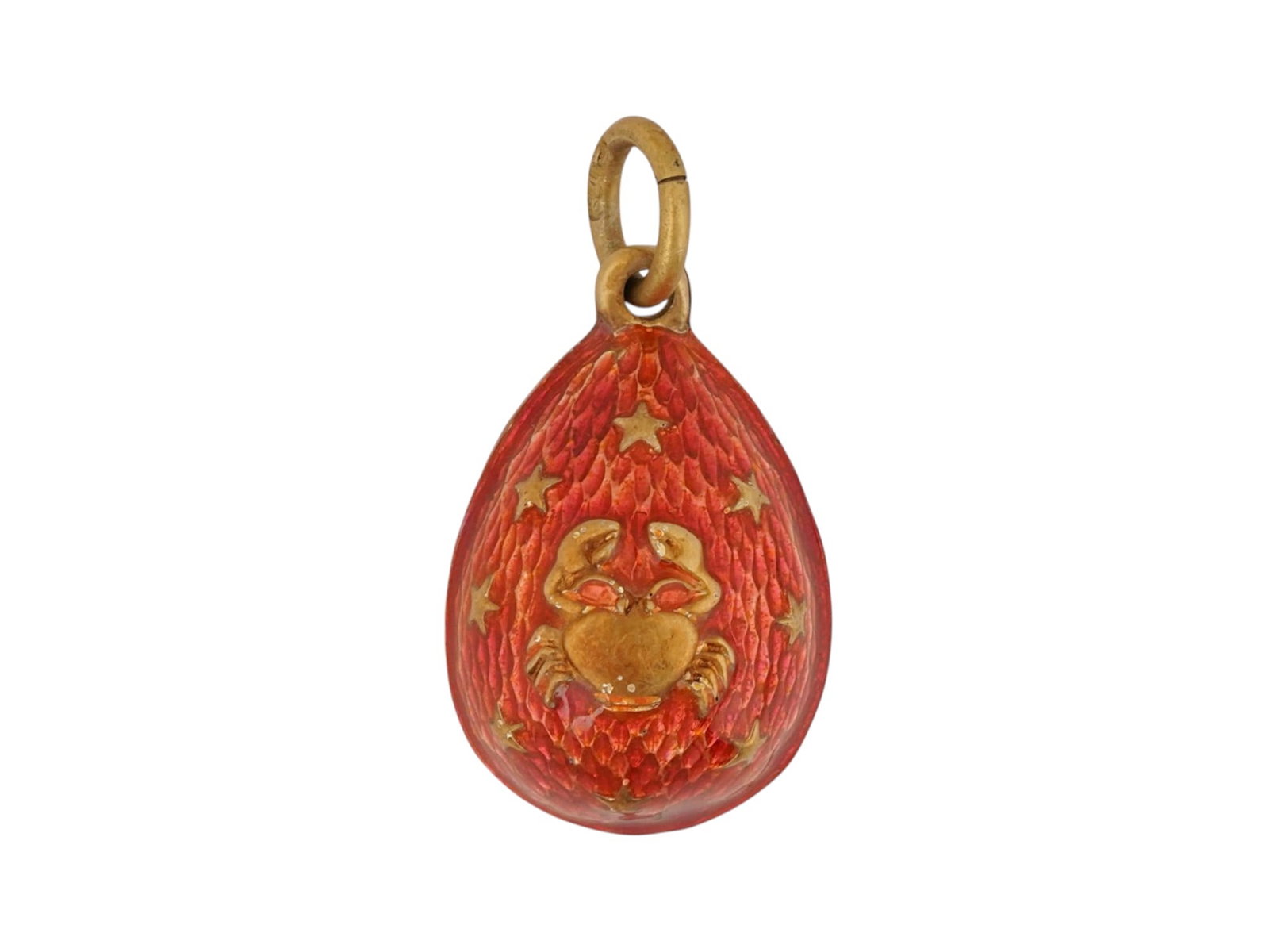 RUSSIAN GILT SILVER GUILLOCHE ENAMEL EASTER EGG PENDANT: A Russian gilt silver guilloche enamel Easter egg pendant. The item features a red enamel surface with decorative gilt stars and a Cancer zodiac sign overlay on the recto side. Hallmarked with 84 Russ