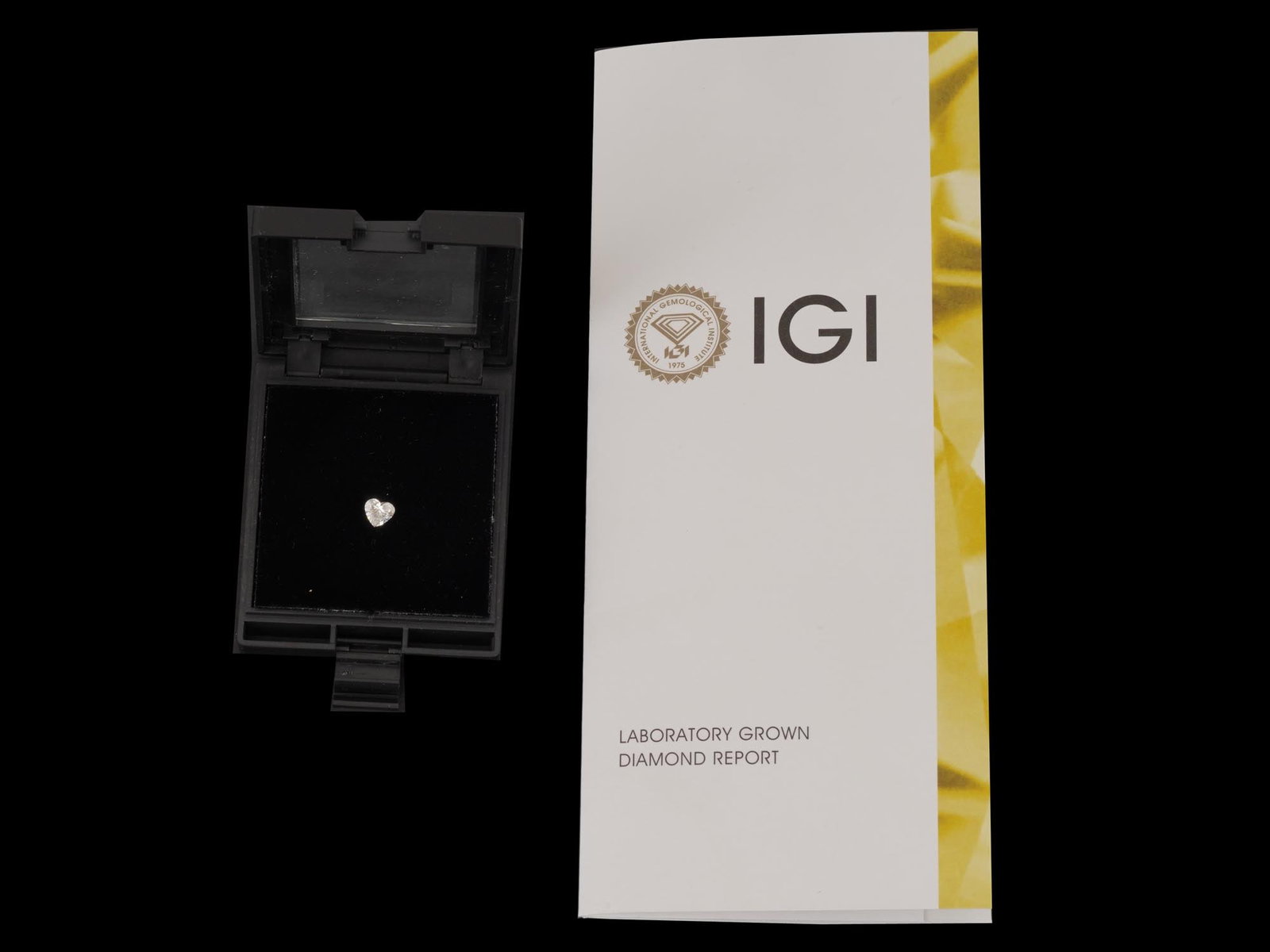 HEART SHAPED 1.01 CT LAB GROWN DIAMOND IGI CERTIFICATE: A heart shaped brilliant cut lab-grown diamond weighing 1.01 carats. Graded by the International Gemological Institute IGI as E color and VS1 clarity, the stone exhibits Excellent polish and symmetry 