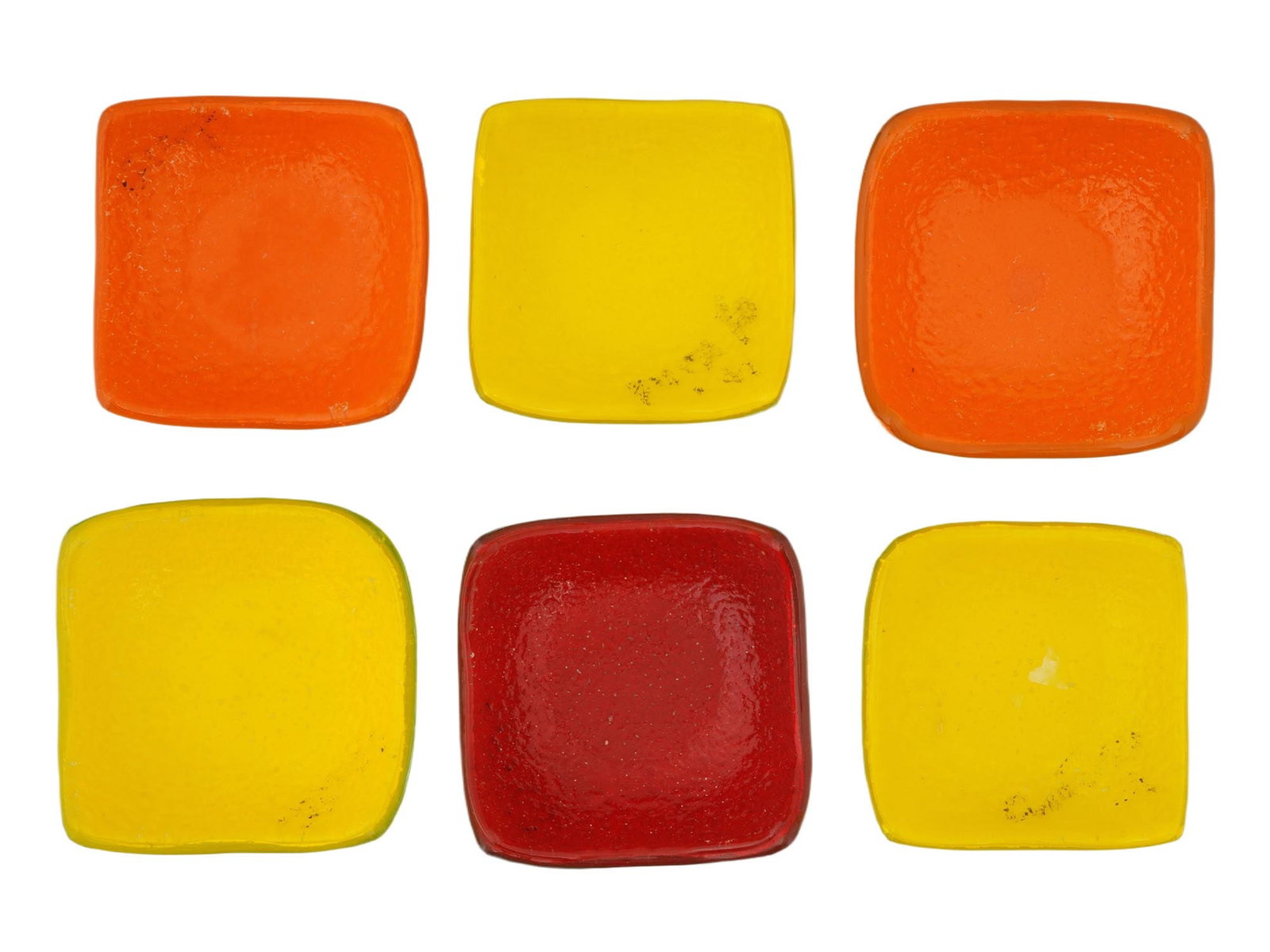 VINTAGE GLASS BOWLS OF VARIOUS COLORS W CURVED CORNERS: A group of six vintage glass bowls of yellow, red and orange colors. They have a smooth, rounded shape with all four corners gently curved, creating a seamless and elegant design. Table and Desk Wares