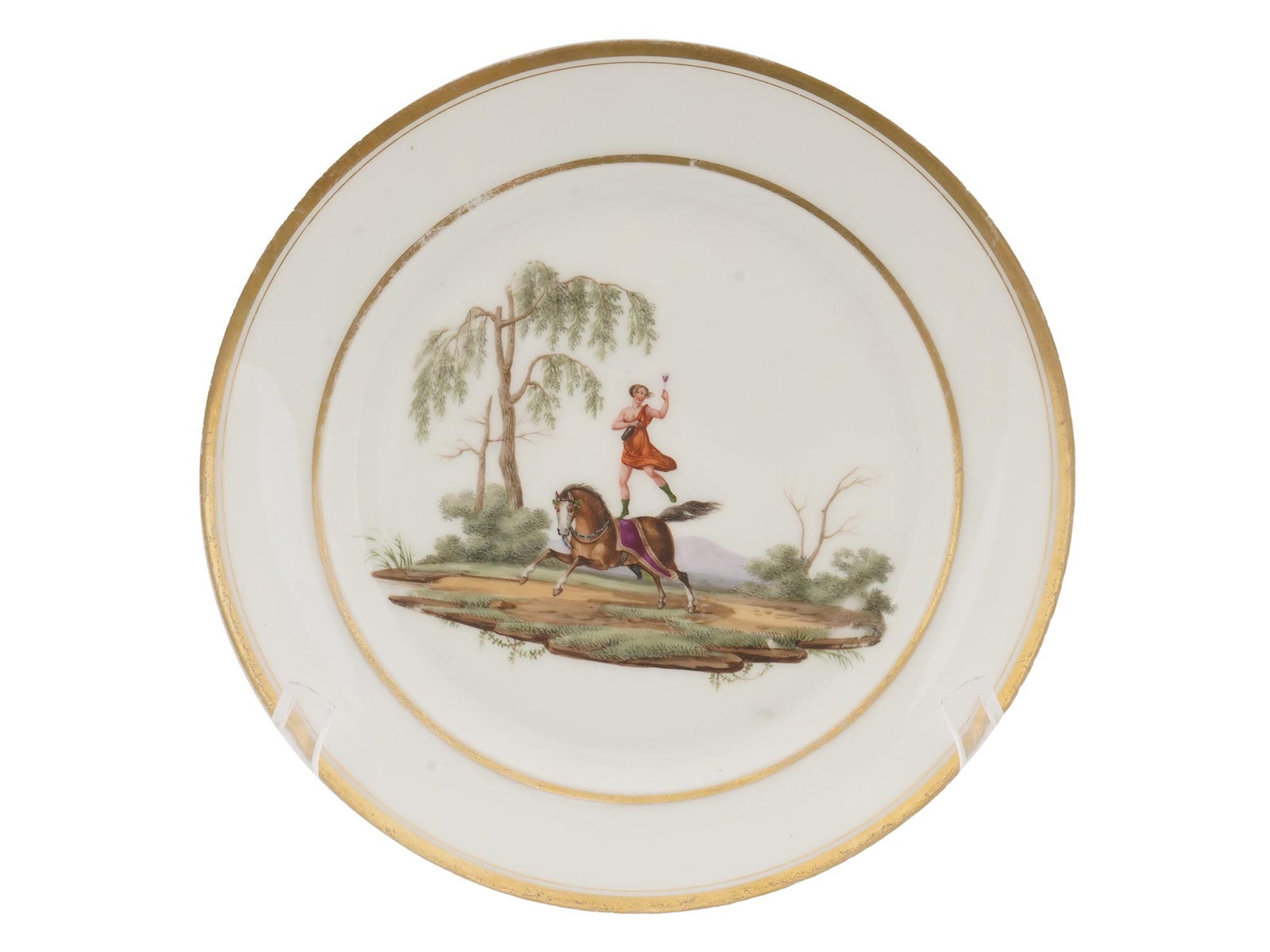 ANTIQUE EARLY DERBY HAND PAINTED PORCELAIN PLATE: An antique early Derby porcelain plate. The plate is glazed and hand painted with an ironic scene with Amur holding a heart in his hand and standing on a galloping horse in a forest landscape. Gilded