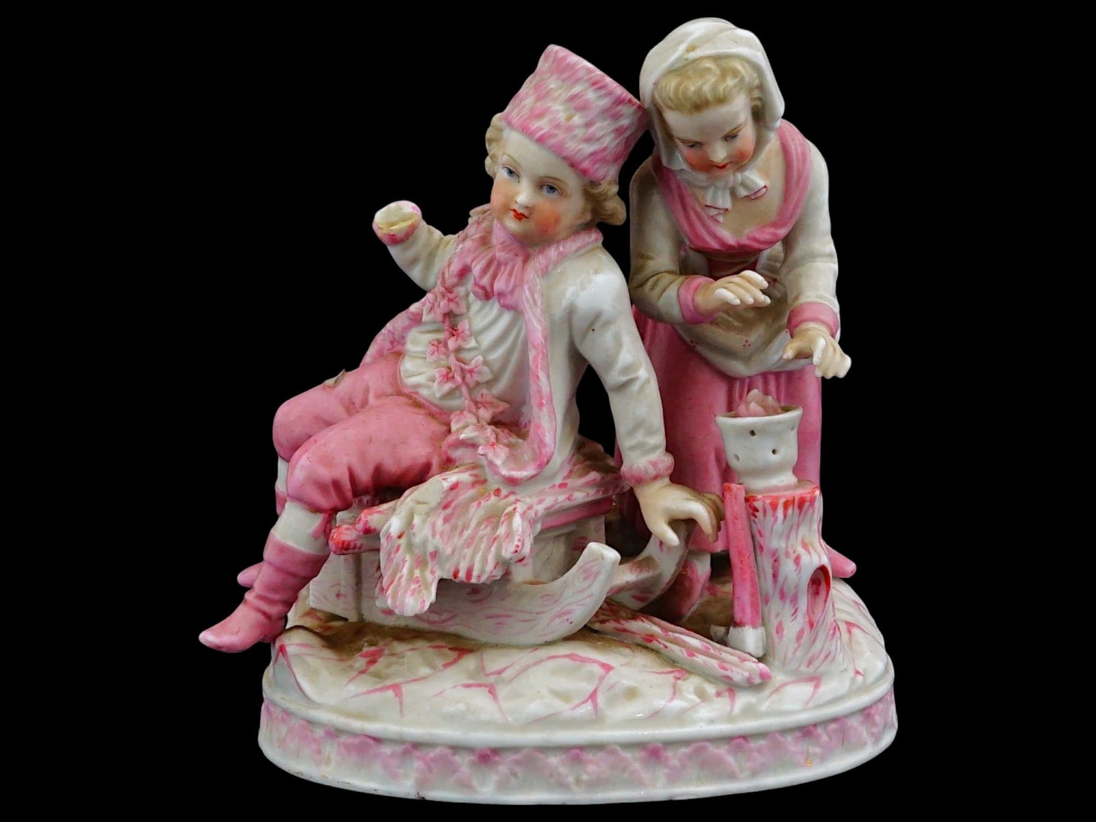 ANTIQUE 19TH CENTURY HAND PAINTED PORCELAIN FIGURE: An antique 19th-century hand-painted porcelain figural group by Sitzendorf, a German manufacturer that functioned in the period from 1849 until 1953. The artwork represents a genre scene with two