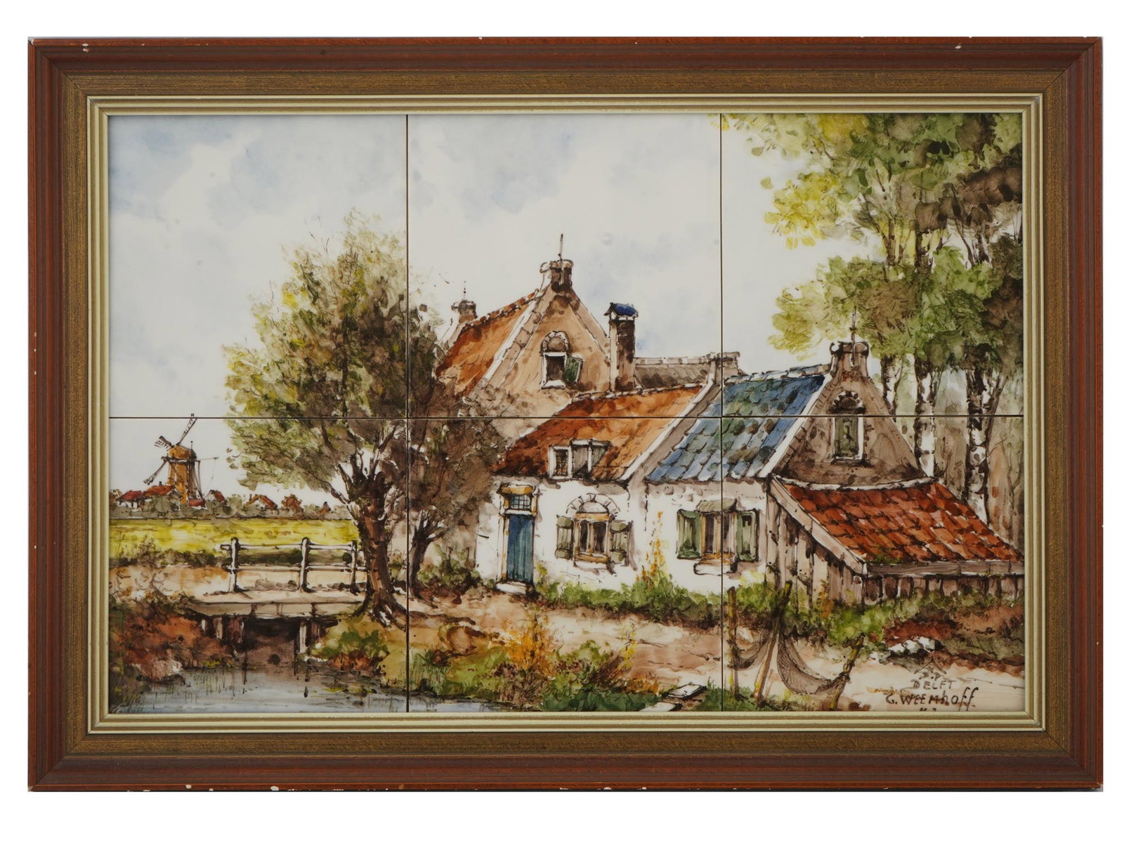 DUTCH DELFT HAND PAINTED TILES SIGNED BY ARTIST: Vintage Dutch Delft hand painted tiles depicting a rural view with houses and a mill. Signed by the artist, G. Weemhoff, and marked and inscribed, Delft, lower right. Framed. Completed with a signed c