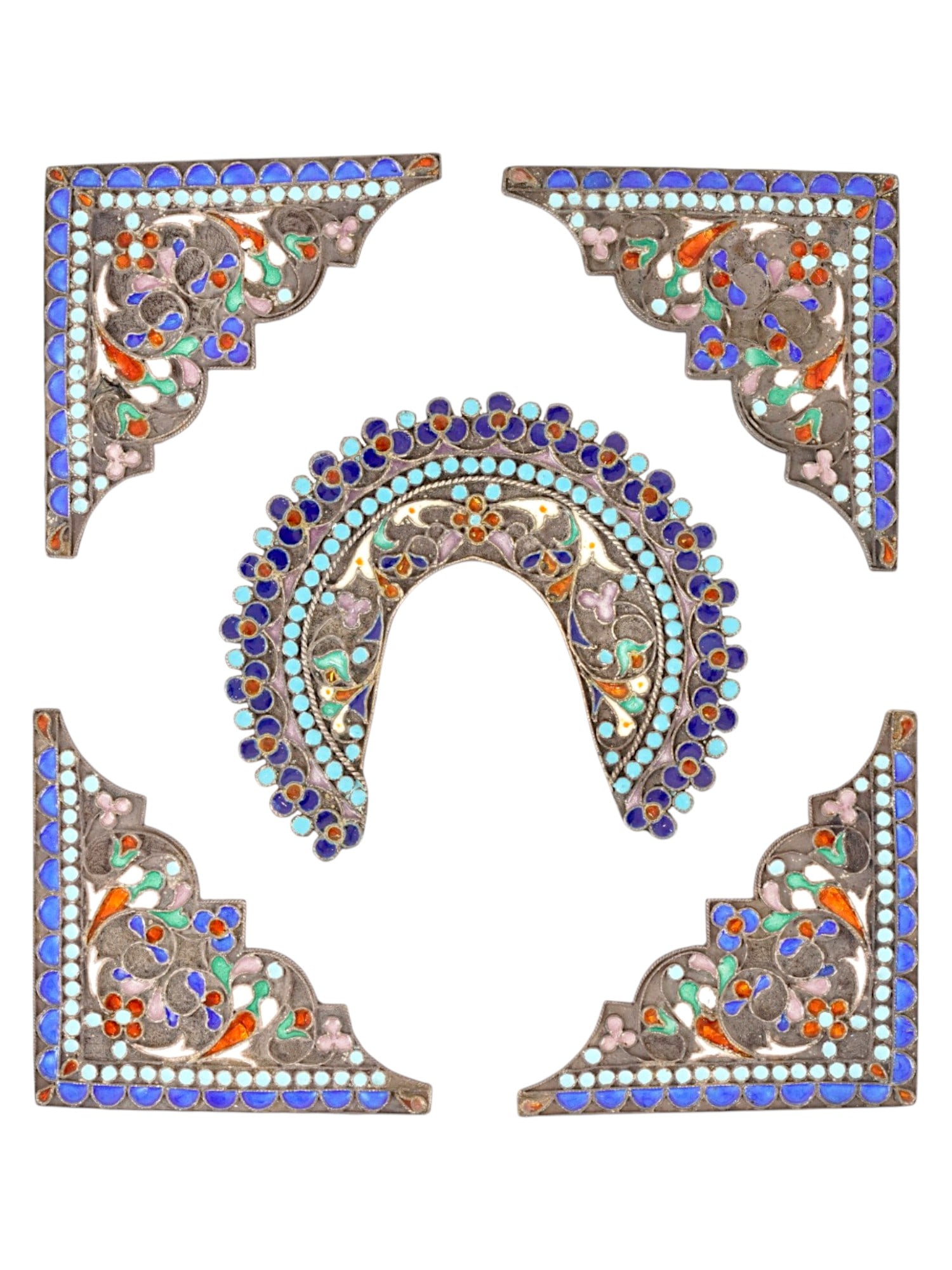 RUSSIAN ORTHODOX ICON SILVER CLOISONNE ENAMEL OKLAD PARTS: A group of silver cloisonne enamel oklad parts for a Russian Orthodox icon. The pieces are a set of metal corners and a central crown decorated with a polychrome pattern using the cloisonne enamel tec