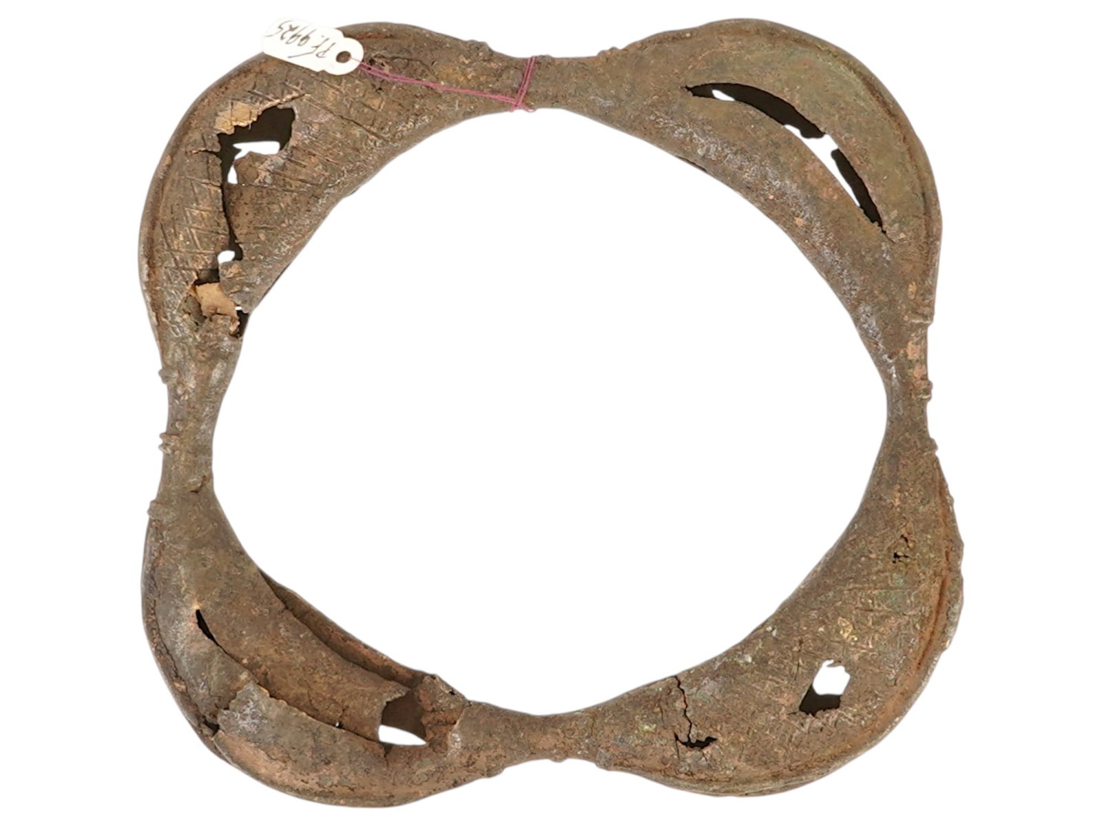 ANTIQUE AFRICAN BRONZE YORUBA RITUAL RATTLE HOOP: An antique African bronze Yoruba ritual rattle hoop, traditionally associated with the Ogboni society of Nigeria. Objects of this type were used in important ceremonial and judicial contexts, where th