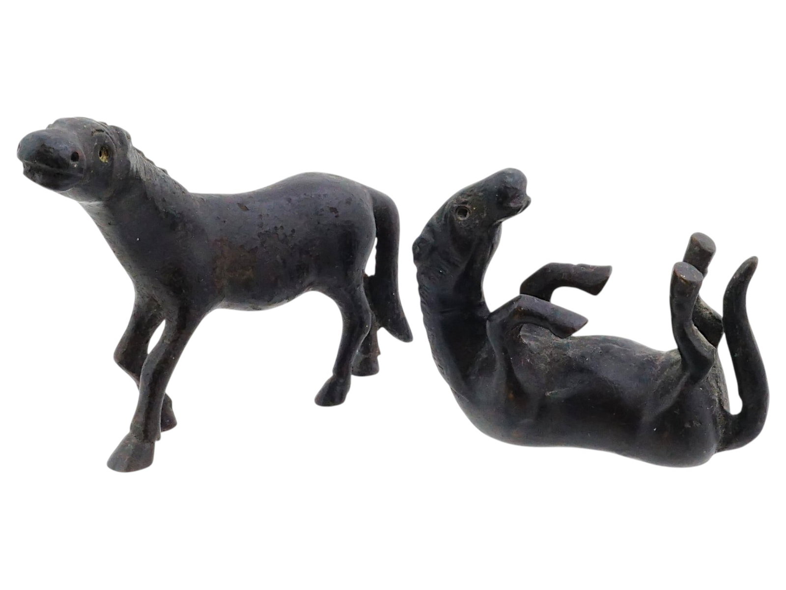 CHINESE QING BRONZE HORSES OF EMPEROR WANG MU: A pair of antique Chinese cast bronze figurines of horses, one walking and the other lying on the back. Late Qing era, before 1912. Black patina. Presumably inspired by the eight horses of King Mu of 