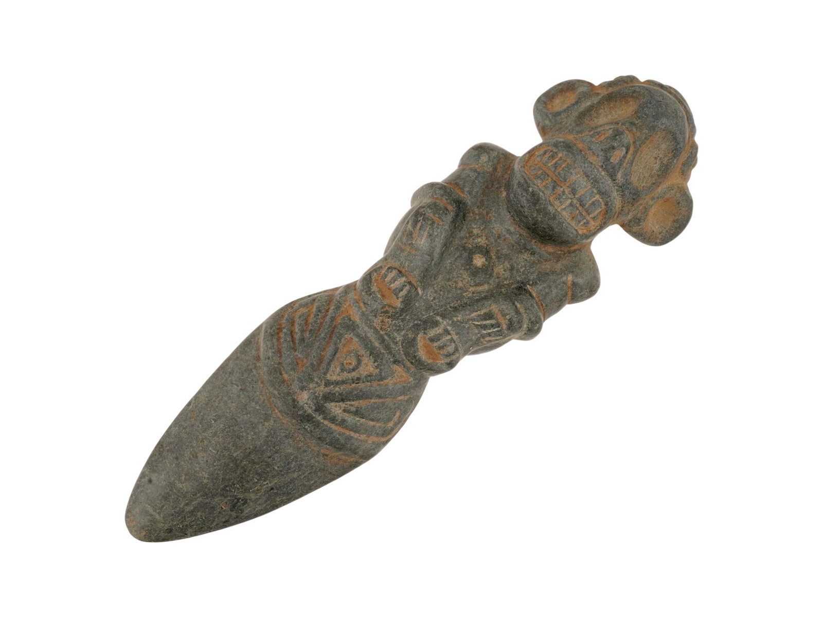 ANCIENT PRE COLUMBIAN TAINO STONE FIGURAL CELT AXE HEAD: An ancient Pre-Columbian Taino carved stone figural celt, or ceremonial axe head. Combines a classic petaloid celt form with a stylized anthropomorphic depiction of a Zemi ancestral spirit, featuring 