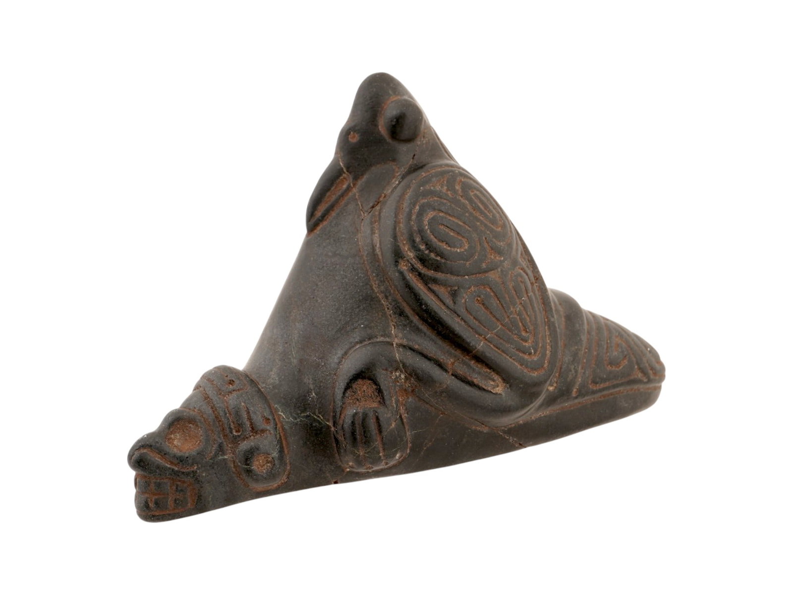 ANCIENT PRE COLUMBIAN TAINO CARVED ZEMI IDOL FIGURINE: An ancient Pre Columbian Greater Antilles Islands Taino stone zemi figurine. A remarkably well preserved stone zemi figure presenting in a traditional three pointed form known as a trigonolith with a