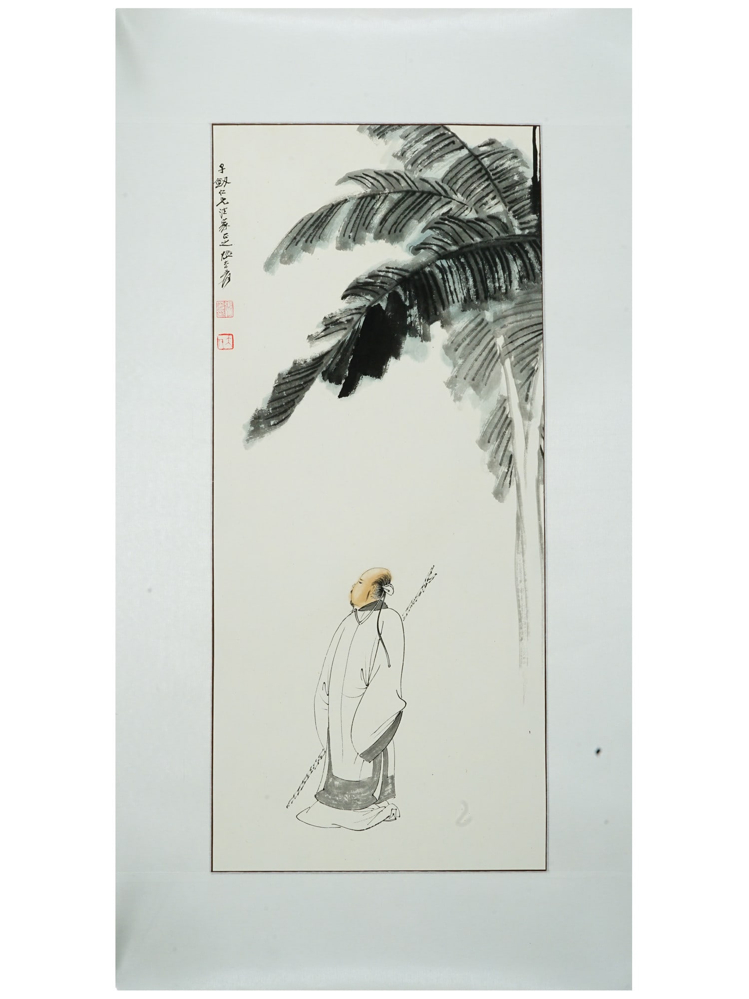 ATTR TO ZHANG DAQIAN CHINESE WATERCOLOR PAINTING: A vintage Chinese watercolor painting on paper depicting a scholar beneath a banana tree, attributed to Zhang Daqian, one of the most celebrated artists of the 20th century. Stamped and inscribed. Vin