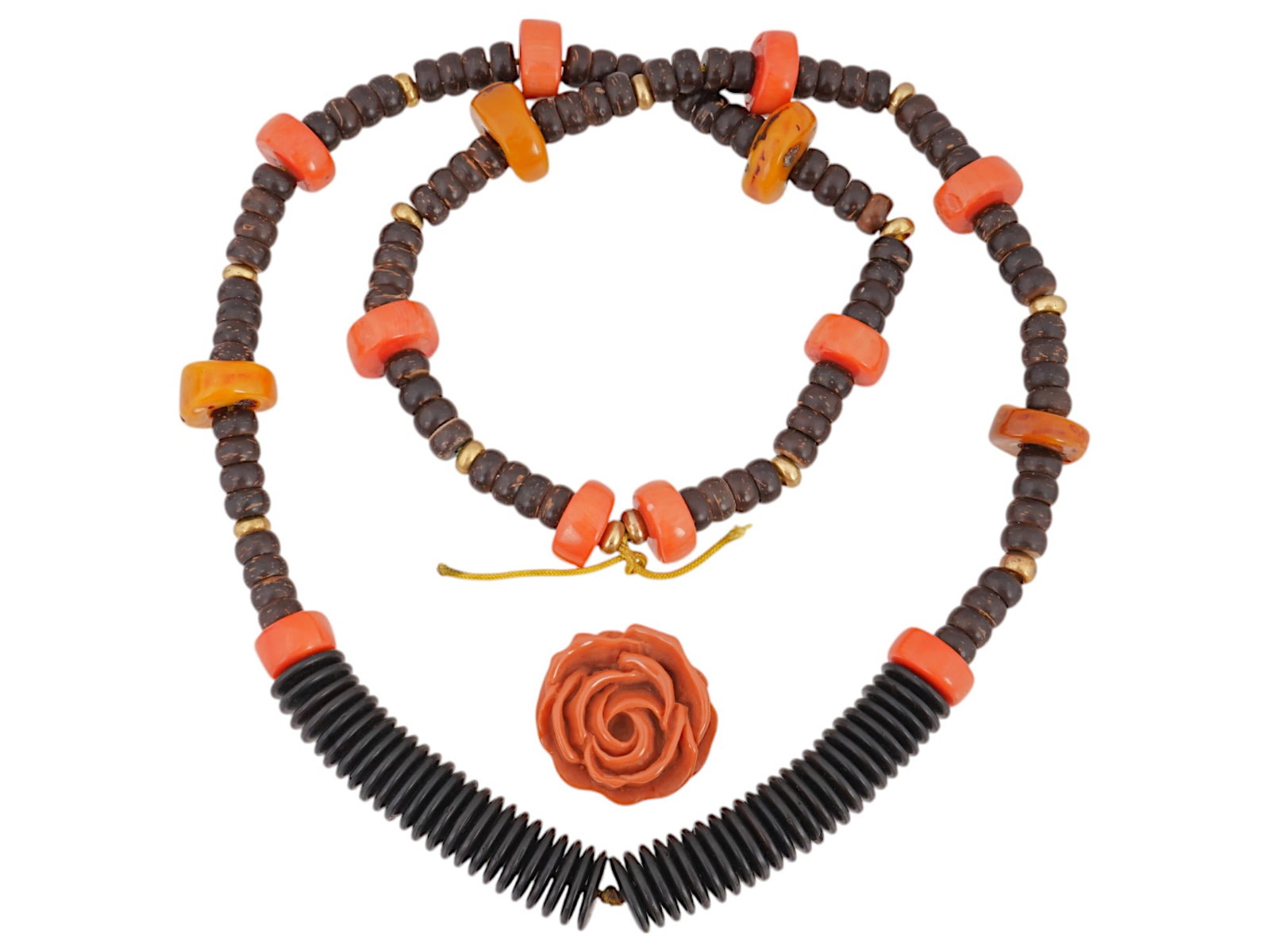 STRING OF BEADS AND ROSE SHAPED DECOR FOR NECKLACE: A string of brown, gilt, and coral red beads and rose shaped decor for a necklace. The beads vary in shape and size, with some being smooth and rounded, while others are more flat. This set of beads i
