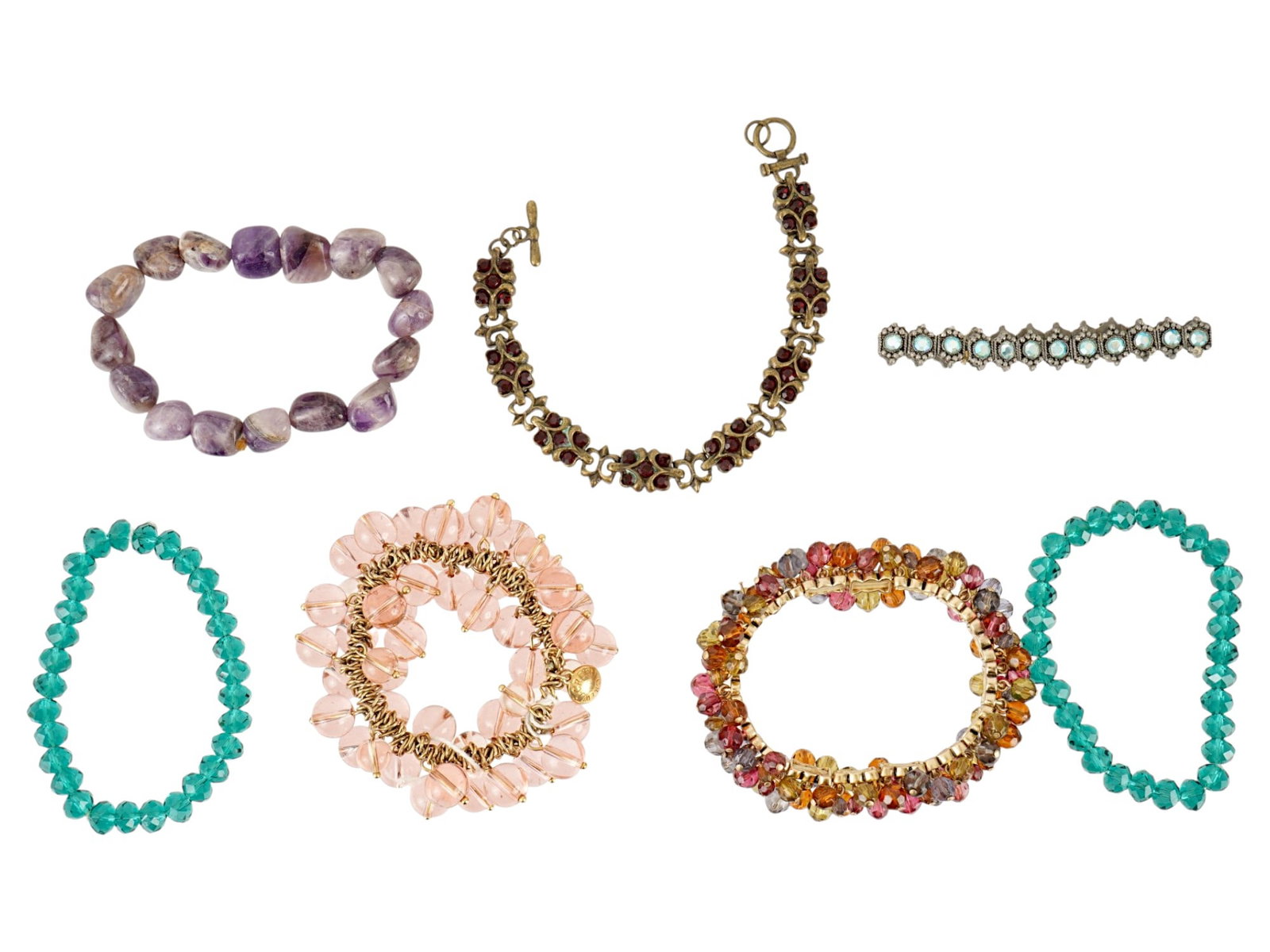 COLLECTION OF SEVEN COSTUME JEWELRY BRACELETS: A collection of seven costume jewelry bracelets. All bracelets are made in different designs and have colored inserts with glass and stones. Vintage Fashion Accessories And Jewelry Collectibles.