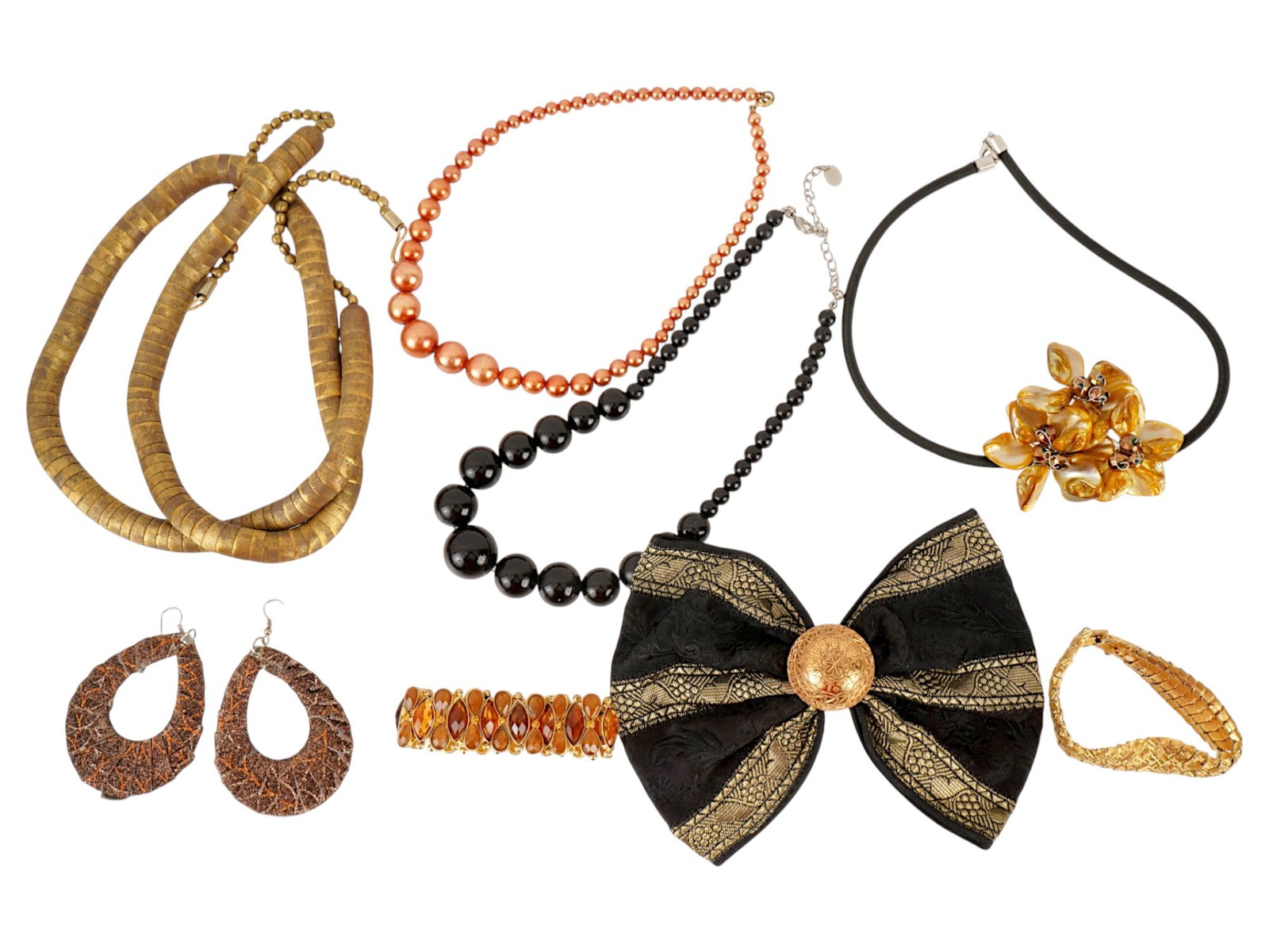 MODERN COSTUME JEWELRY NECKLACES AND PENDANTS: A collection of modern costume jewelry, featuring a variety of fashionable statement pieces crafted from non-precious metals and synthetic materials. The group includes a flexible snake-wrap
