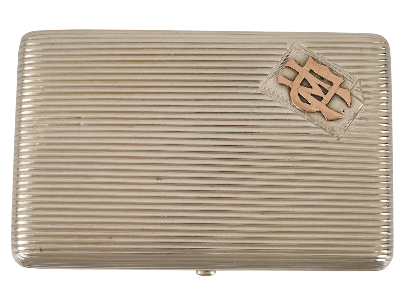 19TH C IMPERIAL RUSSIAN SILVER CIGARETTE CASE W 10K GOLD: An antique 19th century Imperial Russian silver cigarette case of rectangular form with a horizontally reeded exterior. The top right corner features an applied 10k gold Cyrillic monogram. Hallmarked 