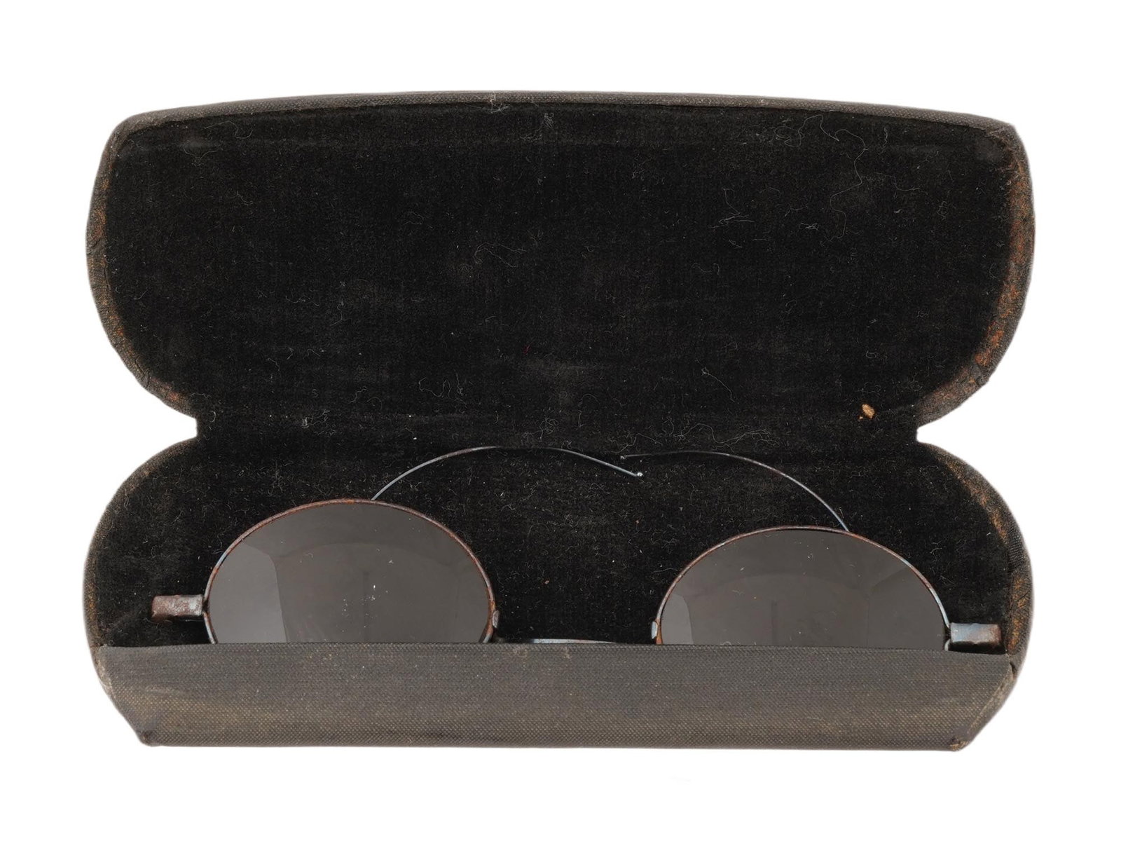 VINTAGE WIRE FRAMED GLASSES BY CHARLES CHARRON: A vintage round wire-rimmed sunglasses from the early-mid 20th-century featuring thin metal rims and flexible wire ear loops designed to wrap securely around the ears. The lenses are tinted, typical o