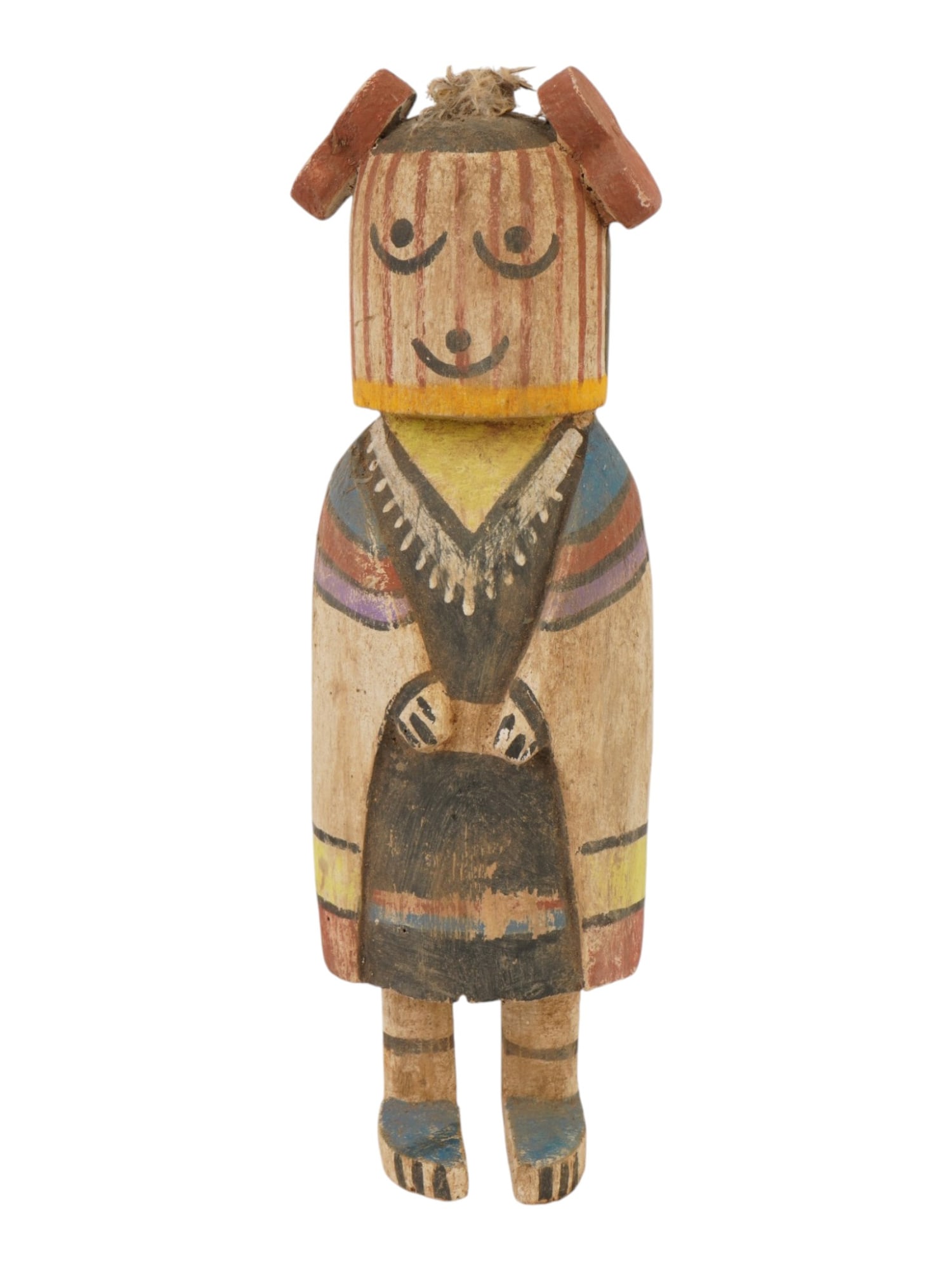VINTAGE AMERICAN CARVED WOOD DOLL FIGURINE: A vintage American carved wood doll figurine. The figurine depicts a stylized standing figure with a prominent rounded head and simplified facial features. The torso is adorned with vibrant color pigm