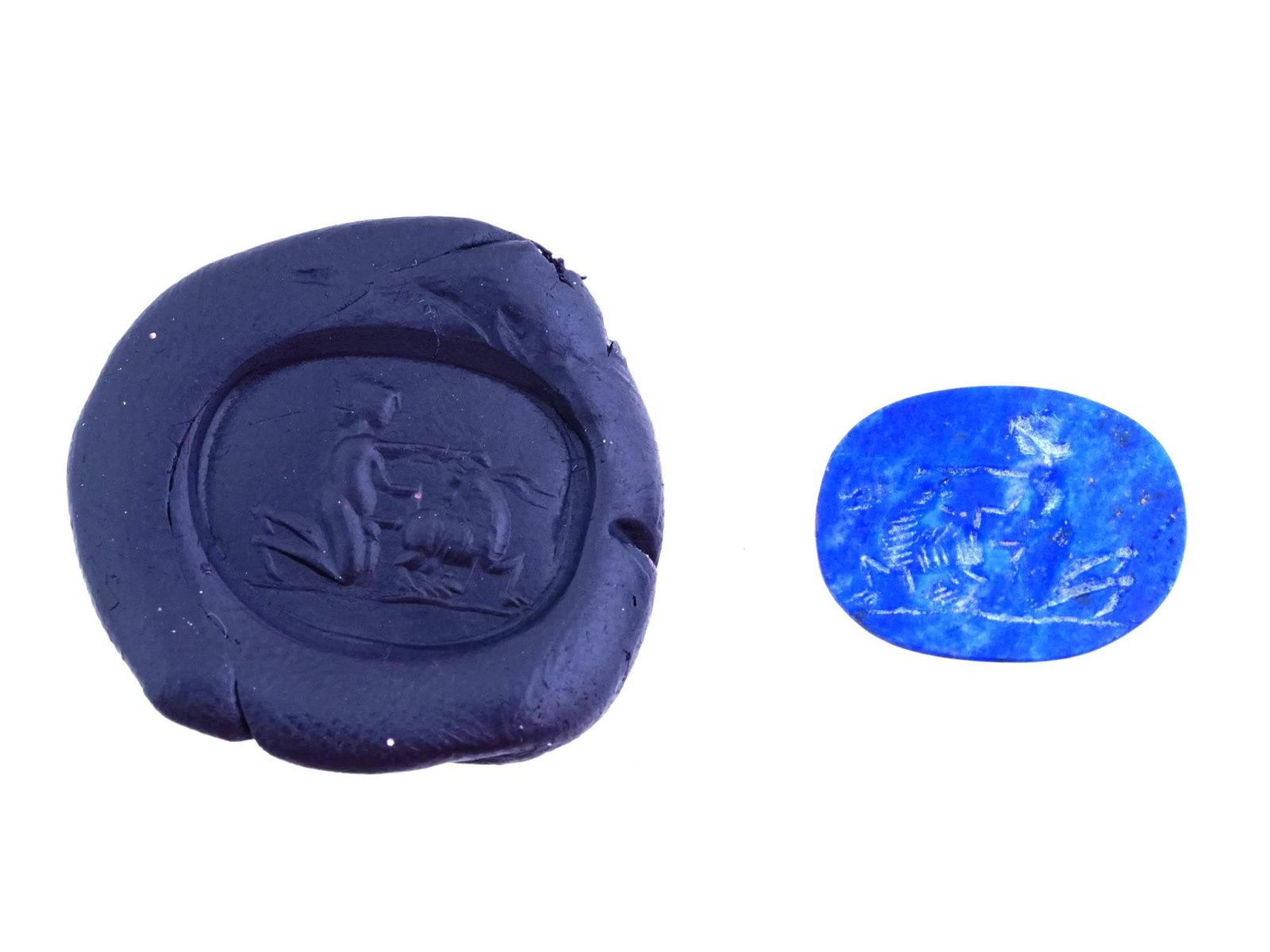 CARVED LAPIS LAZULI INTAGLIO ANCIENT ROMAN EROTIC SCENE: A carved lapis lazuli intaglio featuring a detailed depiction of the ancient Roman erotic scene from classical mythology. Such pieces were often used as personal seals, amulets, or jewelry. Roman Carv