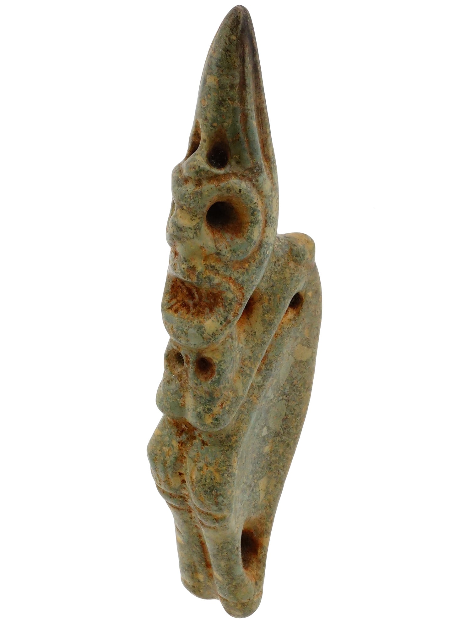 ANCIENT PRE COLUMBIAN TAINO STONE FIGURINE: An ancient Pre-Columbian Taino stone figurine depicts a stylized avian or anthropomorphic deity with an elongated, tapering headdress and deeply recessed orbital cavities. The piece is rendered in a c