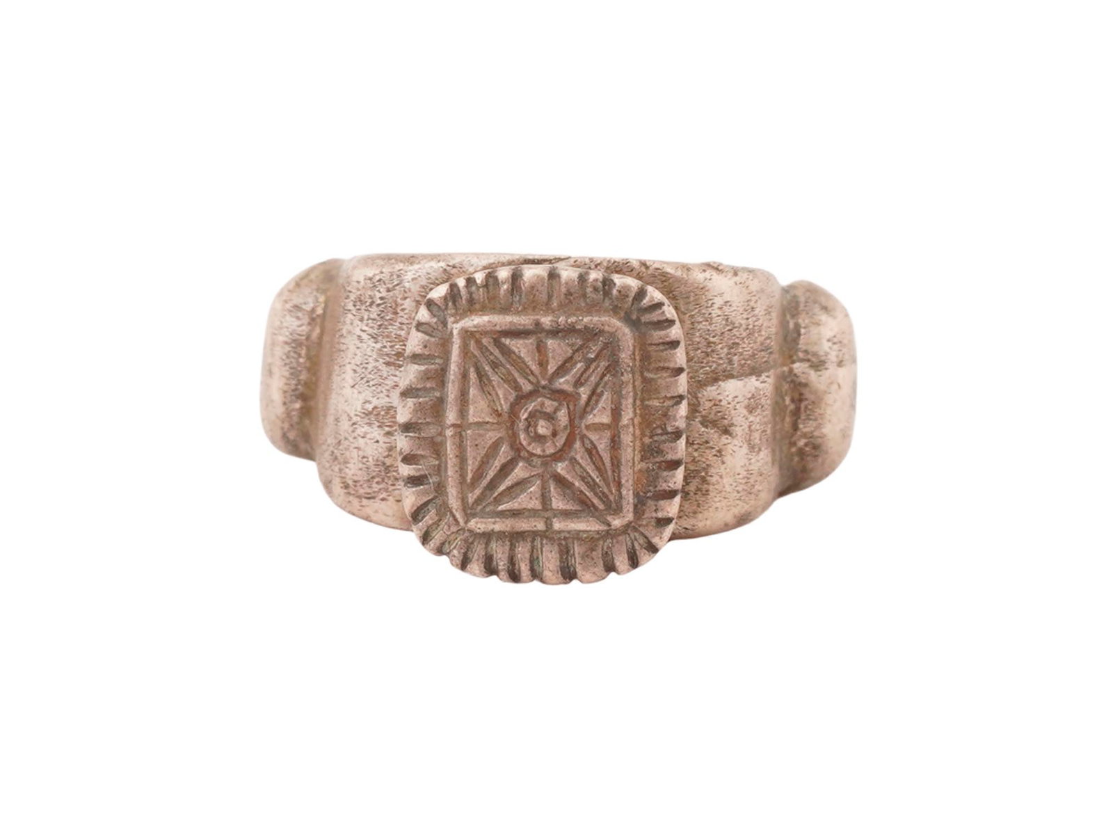 ANCIENT BYZANTINE SILVER SIGNET RING 400 TO 600 AD: An ancient Byzantine Silver signet ring, dating from 400 to 600 AD. The ring features a rectangular shaped bezel engraved with geometrical ornaments. The band of the ring is adorned with a relief desi