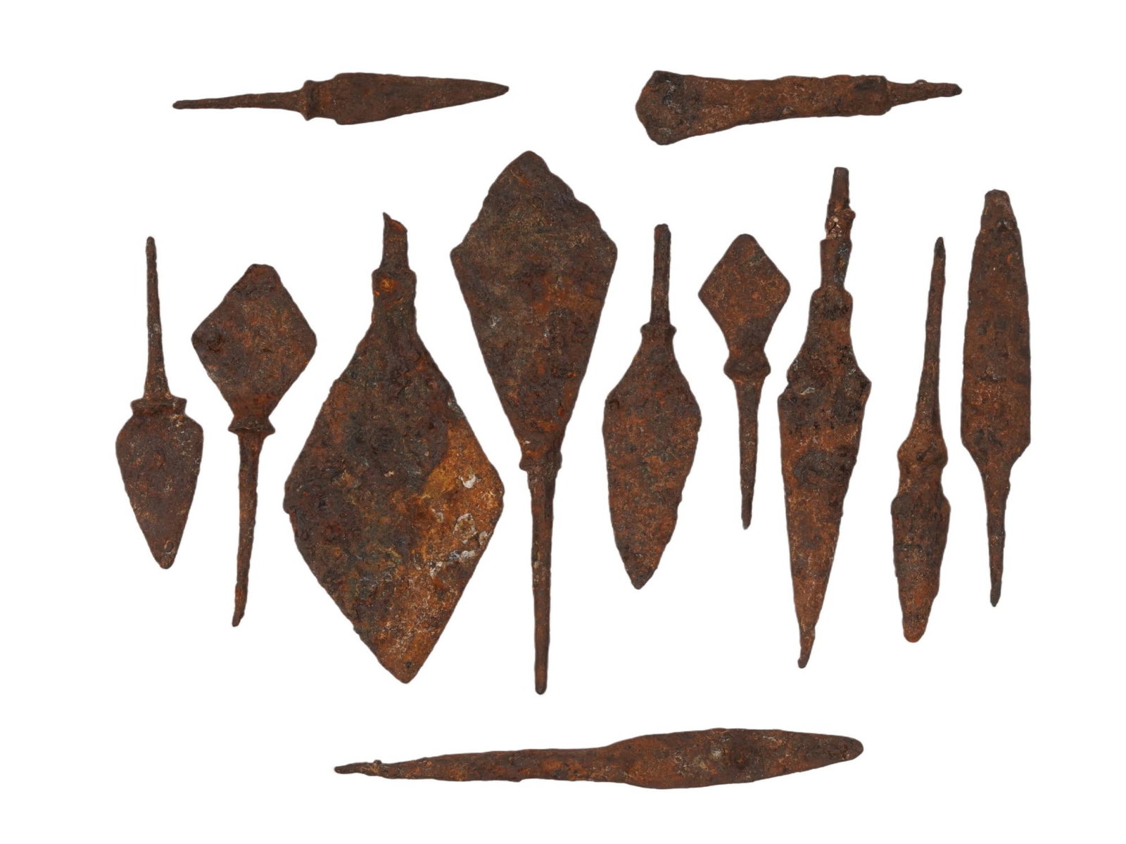 GROUP OF ANCIENT MEDITERRANEAN IRON ARROWHEADS: A lot of Ancient Mediterranean iron arrowheads. Ancient Greece or Rome, 300 BC to 100 AD. A total of 12 items. Archaeological Finds And Historical Relics, Metalwork, Weaponry And Armor. THIS LO