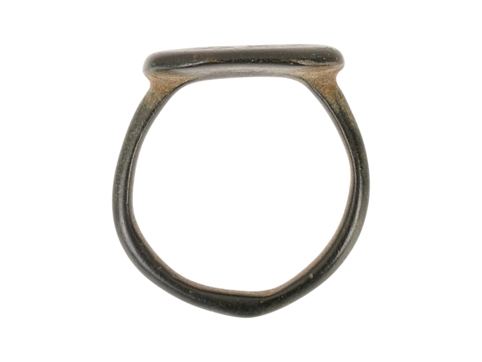 ANCIENT ISLAMIC BRONZE RING ENGRAVED 600 TO 800 AD: An ancient Islamic bronze signet ring, dating from 600 to 800 AD. The ring features an eye against evil, an octagonal-shaped bezel engraved with ornaments. Ancient Bronze Jewelry Wares, Archaeological