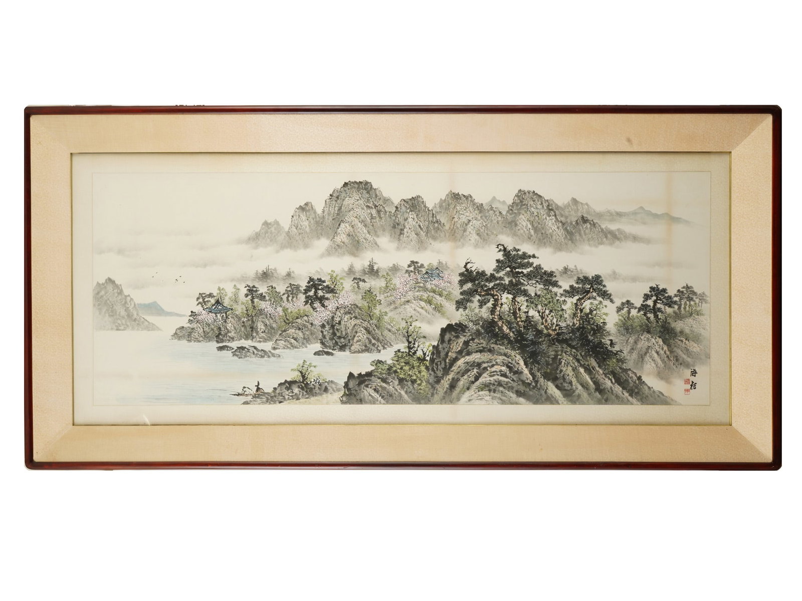 LARGE CHINESE LANDSCAPE WATERCOLOR PAINTING: A large Chinese horizontal landscape watercolor painting depicting a mountainous river village enveloped in heavy mist, featuring blossoming spring trees, traditional pavilions, and figures on a boat.