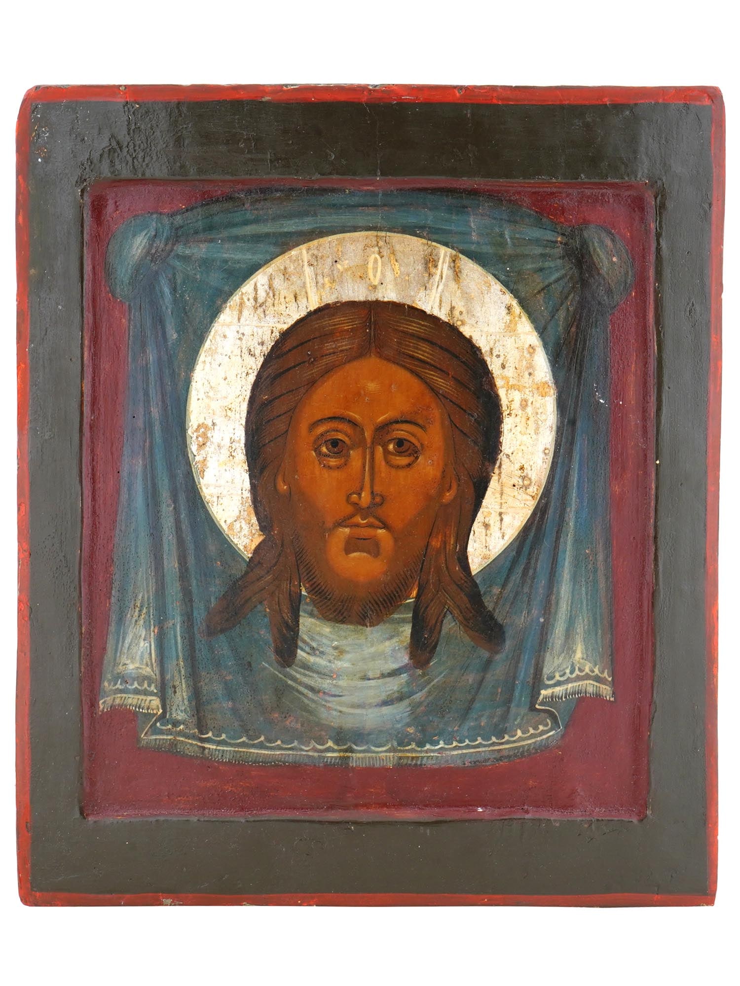 ANTIQUE 17TH C RUSSIAN ICON SAVIOR NOT MADE BY HANDS: An antique 17th-century Russian Orthodox icon representing Jesus in the Acheiropoieta iconography, also known as Savior Not Made By Hands or Veil of Veronica in Western Christianity. Mixed media paint