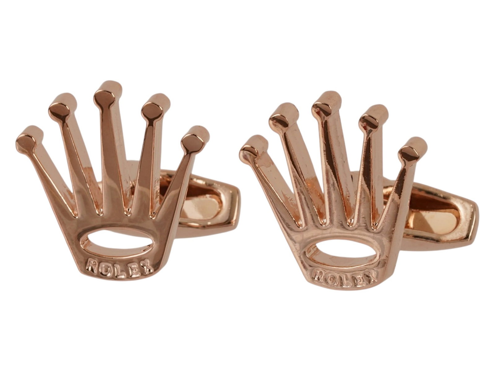 PAIR OF MENSWEAR ROLEX CROWN LOGO DESIGN CUFFLINKS: A pair of cufflinks is fashioned in the likeness of the signature five point Rolex crown logo, featuring a polished rose gold tone finish. Each piece is constructed with a swivel toggle back