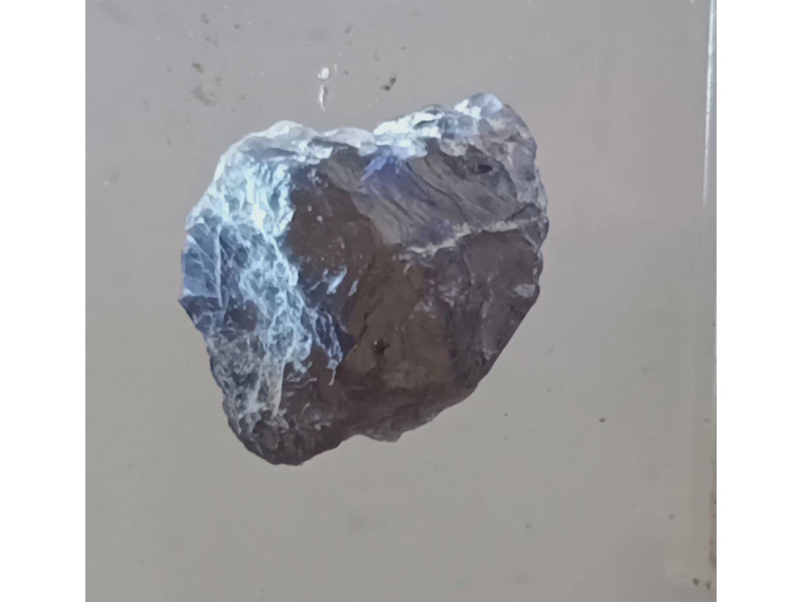DARK BLUE IOLITE GEMSTONE: Dark blue iolite gemstone. Weight: 2.76 grams / 13.8 ct. Origin: Mogok township, Mandalay reg. Myanmar. (IO1/2) THIS LOT QUALIFIES FOR A 30-DAY UNCONDITIONAL RETURN FROM THE DATE OF SALE. BUYERS ARE