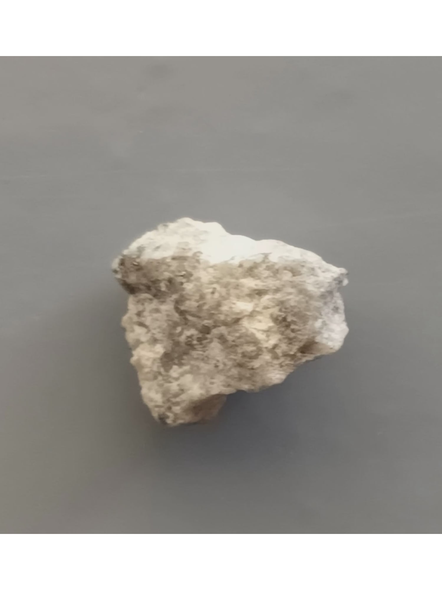 GOLD ON MATRIX: Grey crystalline quartz with native gold and pyrite microcrystals. Weight: 0.63 grams. Origin: Sta. Cruz, Rosario, Agusan del Sur, Mindanao, Philippines. (GOM6/29) THIS LOT QUALIFIES FOR A 30-DAY