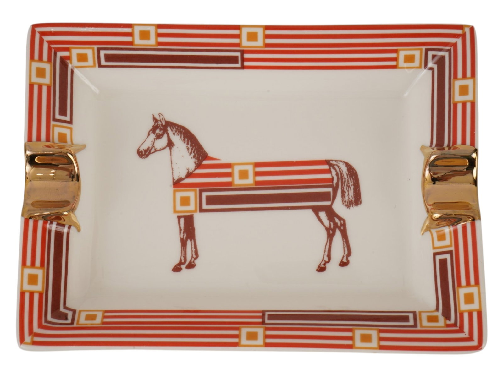 VINTAGE FRENCH HERMES QUADRIGE PORCELAIN ASHTRAY: A vintage French Hermes Quadrige porcelain ashtray, featuring the horse motif designed by artist Pierre Peron in 1973. The design presents a stylized geometric interpretation of a harnessed horse,