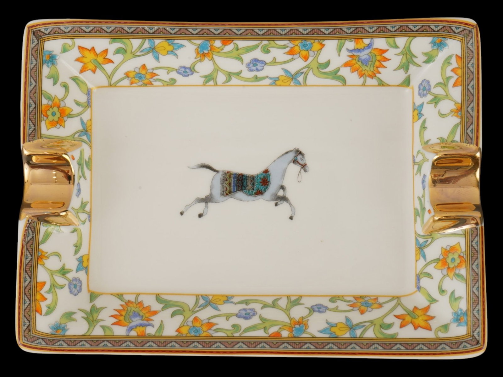 VINTAGE FRENCH HERMES CHEVAL DORIENT PORCELAIN ASHTRAY: A vintage French Hermes Cheval dOrient porcelain ashtray, part of the celebrated equestrian-inspired collection that draws its influence from the detailed Persian miniatures of the 15th and 16th