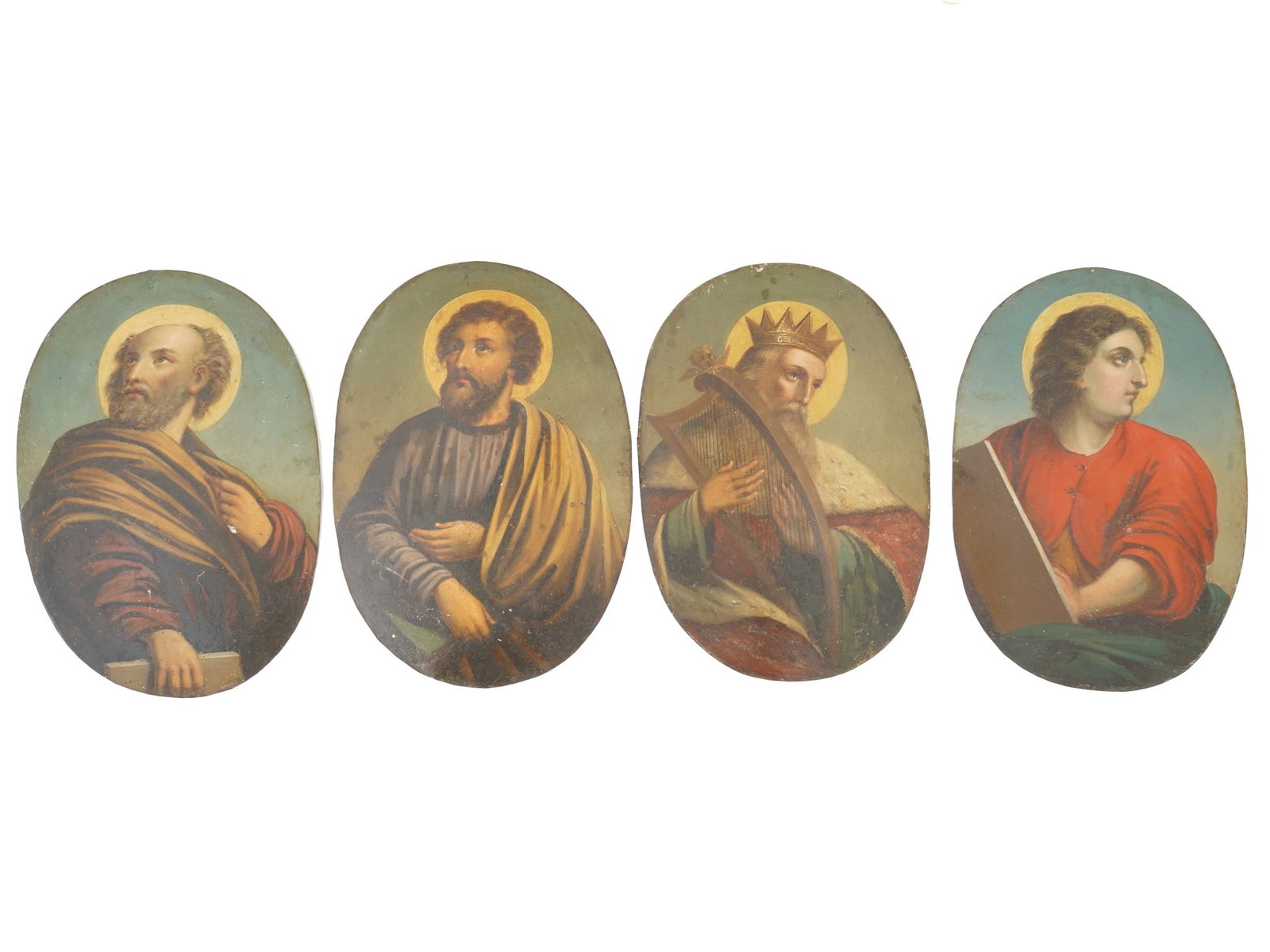 FOUR ANTIQUE RELIGIOUS PLAQUES EVANGELISTS KING DAVID: A group of four antique religious plaques, each featuring hand-painted depictions of saints on metal. Subjects include the Evangelists and King David, rendered in rich colors and traditional