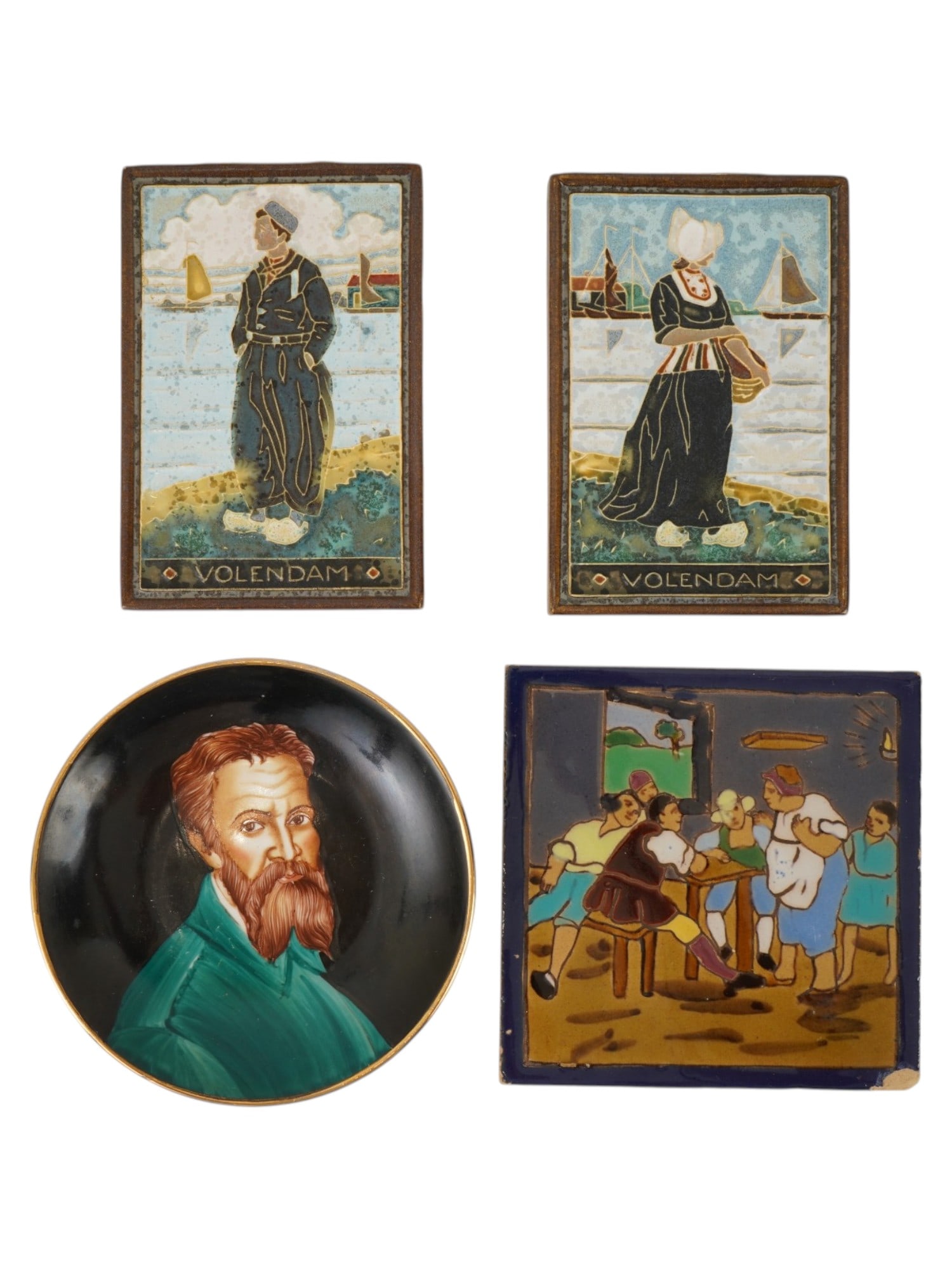 LOT OF VINTAGE EUROPEAN CERAMIC WALL PLAQUES: A lot of vintage ceramic wall decor. A total of 4 items. A pair of matching vintage Dutch cloisonne enameled ceramic wall plaques representing a man and woman in traditional costumes against the lands