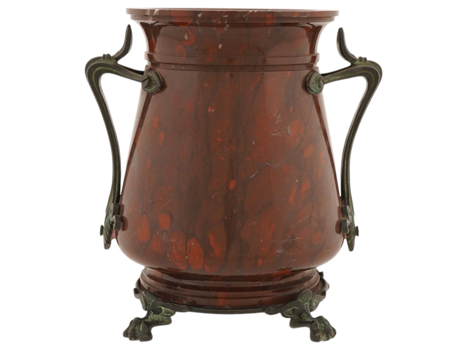 FRENCH STYLE POLISHED RED STONE AND BRONZE VASE: A French style vase, beautifully combining polished natural red stone with patinated bronze metalwork. The stone body is embellished with dark, patinated bronze fittings. Two highly stylized Art