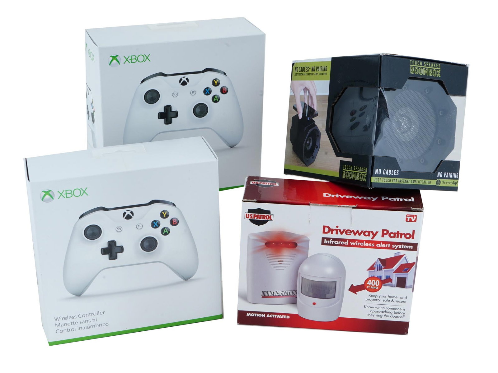 WIRELESS XBOX CONTROLLERS TOUCH SPEAKER ALERT SYSTEM: A lot of four various wireless items including two Xbox wireless controllers, Touch Speaker, and Driveway Patrol Infrared wireless alert system. Vintage and Modern Wireless accessories For Collectors,