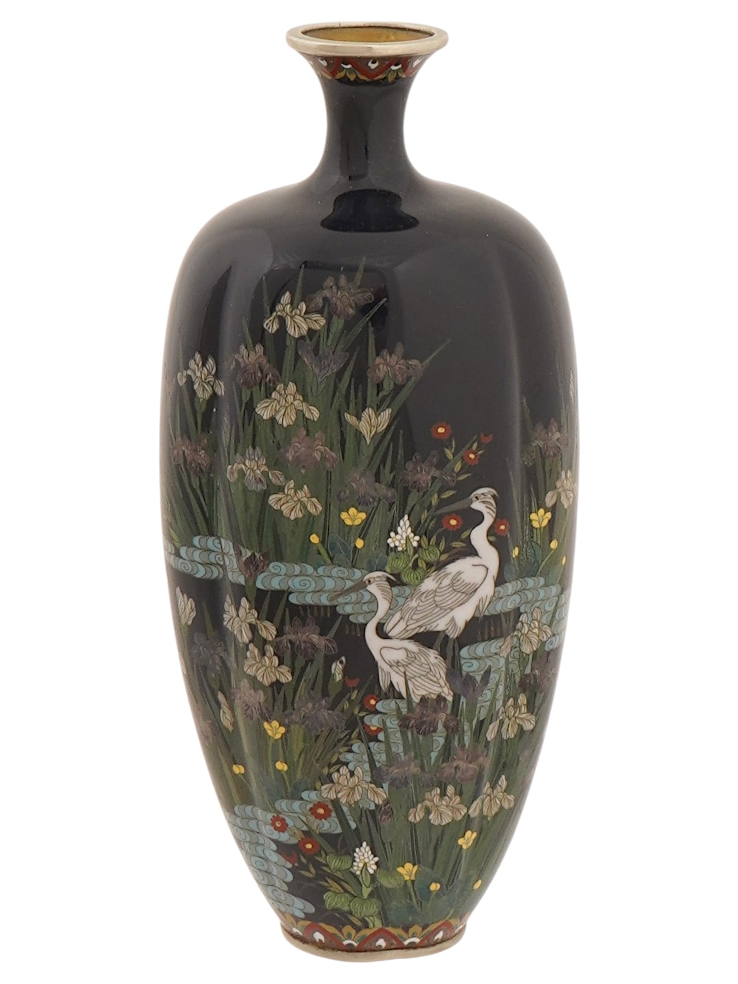 JAPANESE WHITE CRANES DESIGN CLOISONNE ENAMEL VASE: A Japanese enamel vase. The vase has an amphora shaped body and a narrow fluted neck. The ware is enameled with a polychrome design representing white cranes on a pond with blossoming flowers on the b