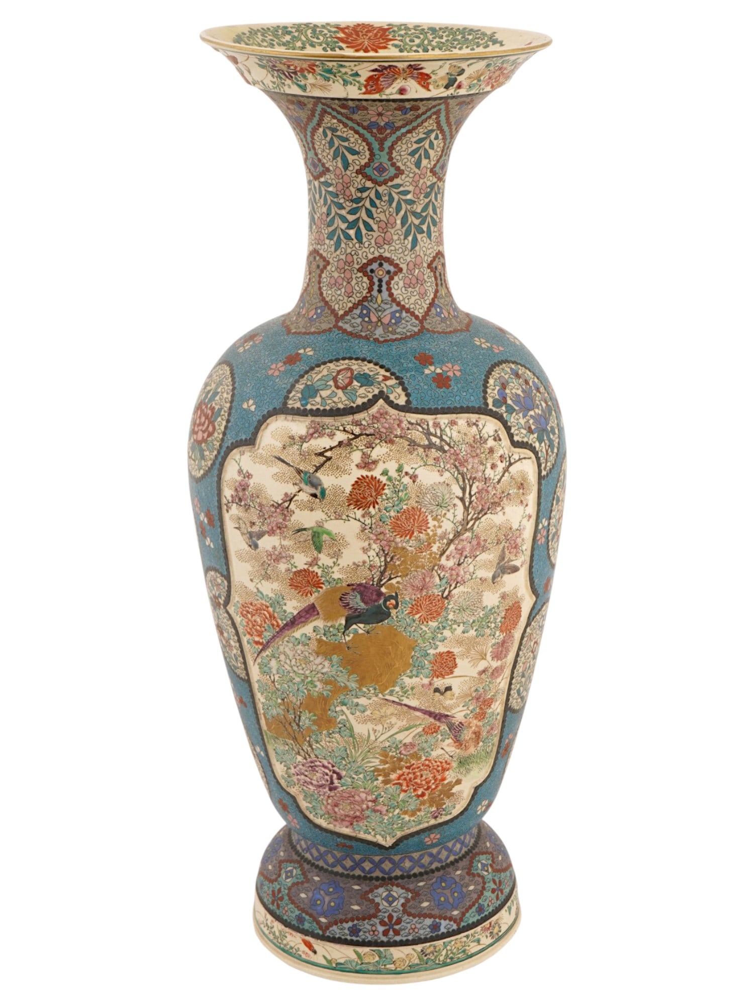 ANTIQUE JAPANESE MEIJI PORCELAIN CLOISONNE VASE: A large antique Japanese porcelain vase with cloisonne enamel design. Late Meiji period, before 1912. The baluster-shaped vase with an elongated neck that flares widely towards the top. Raised on a ro